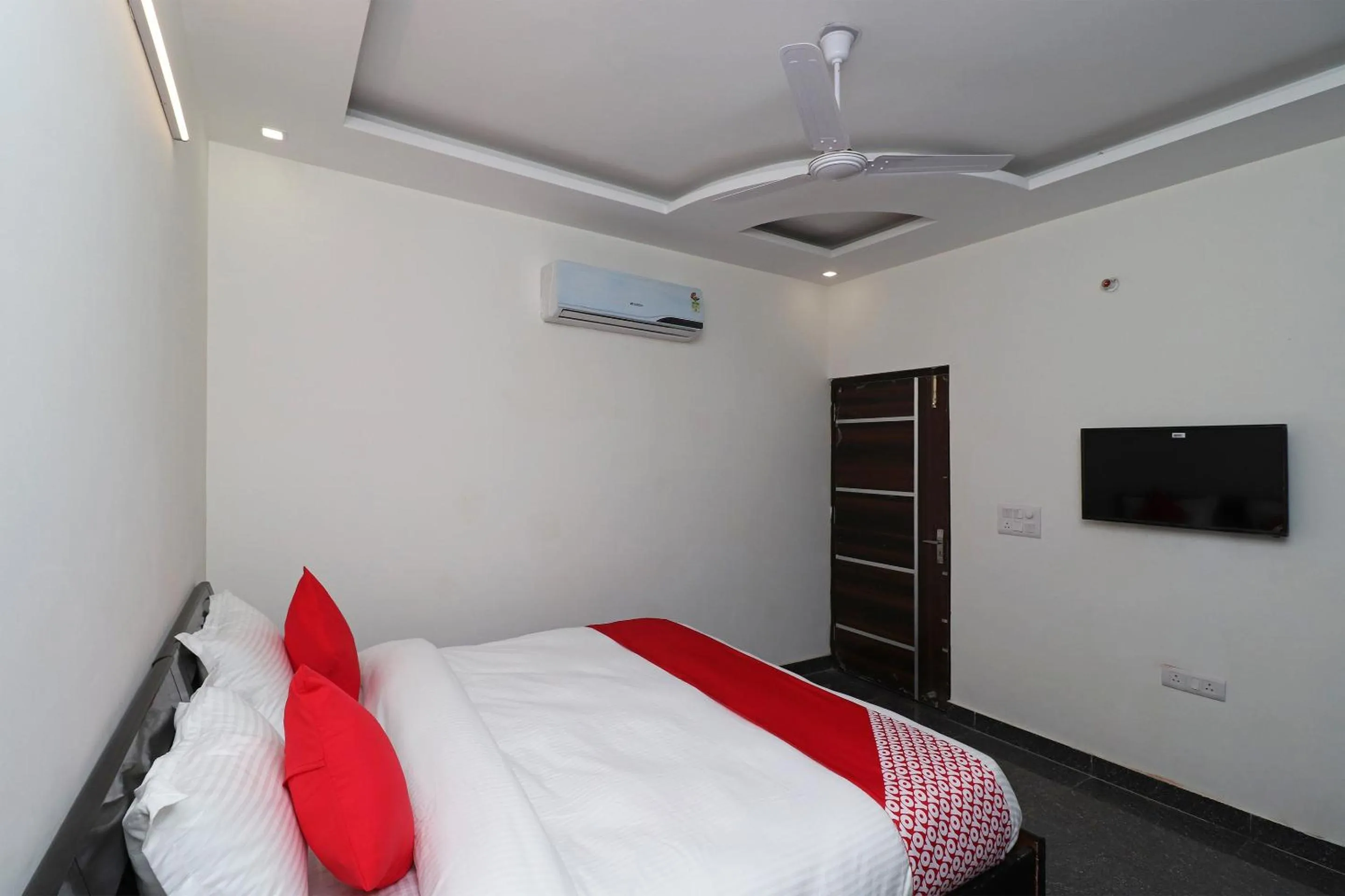 Bedroom in Hotel O Laxmi Residency