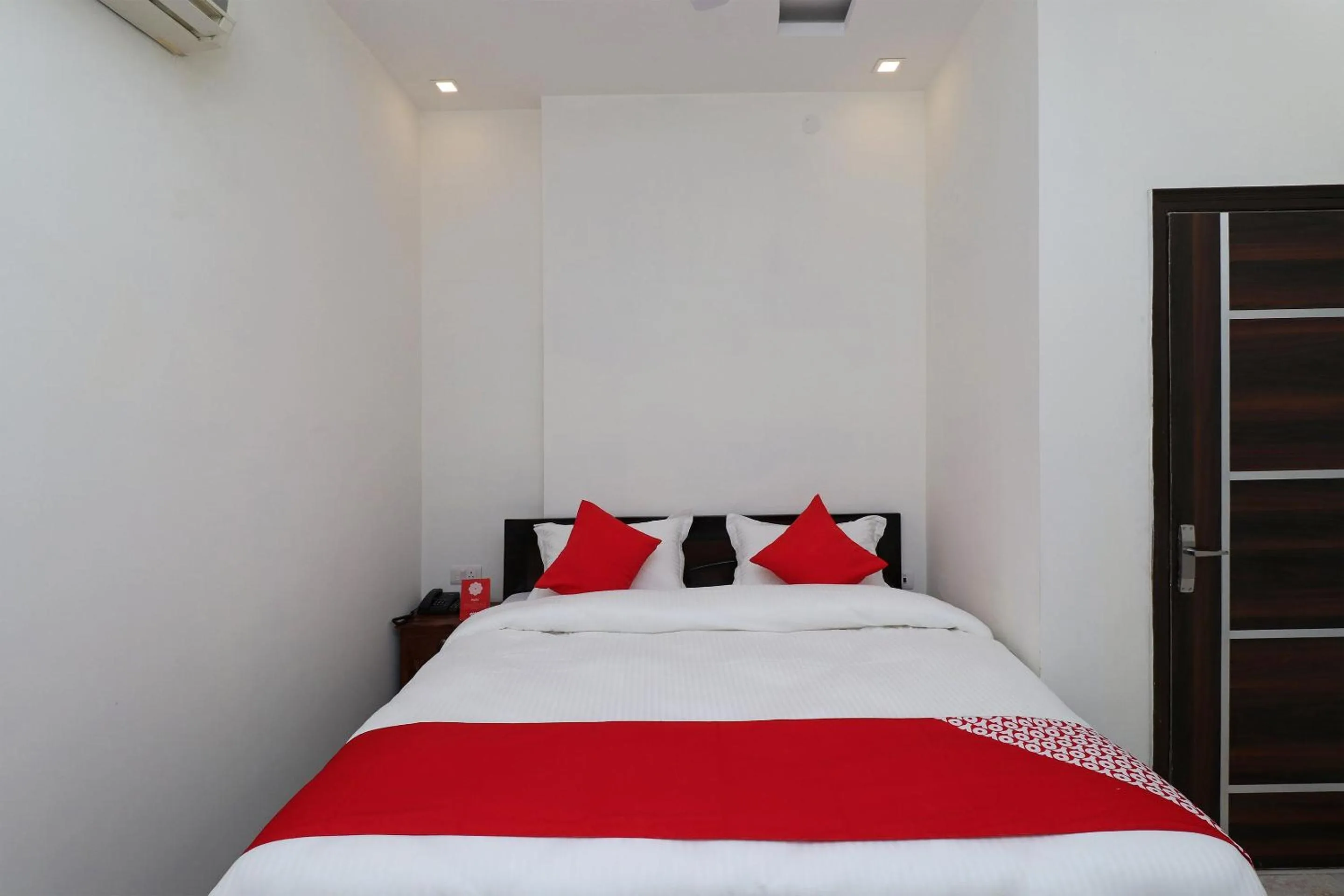 Bedroom in Hotel O Laxmi Residency