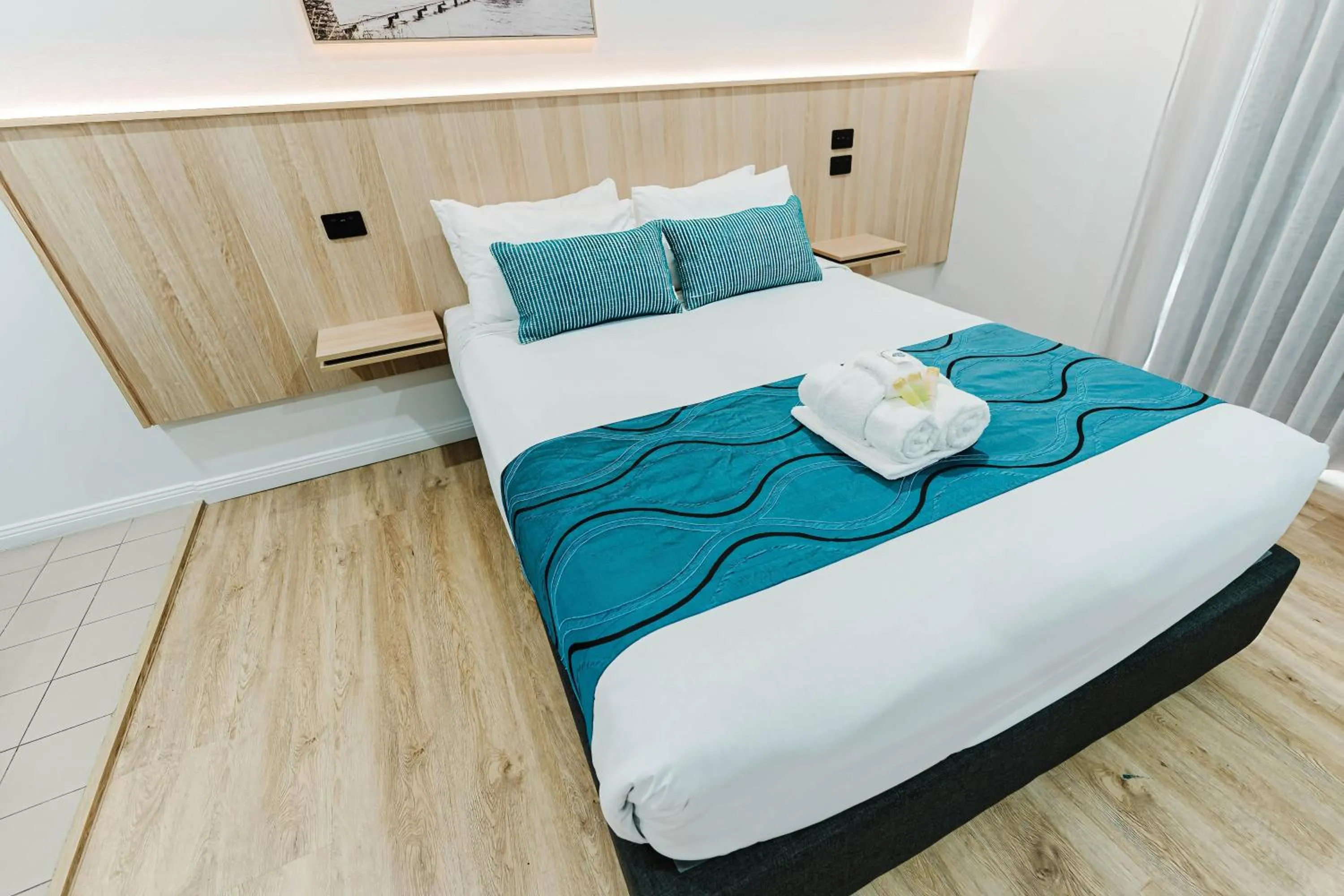 Bed in Country 2 Coast Motor Inn Coffs Harbour