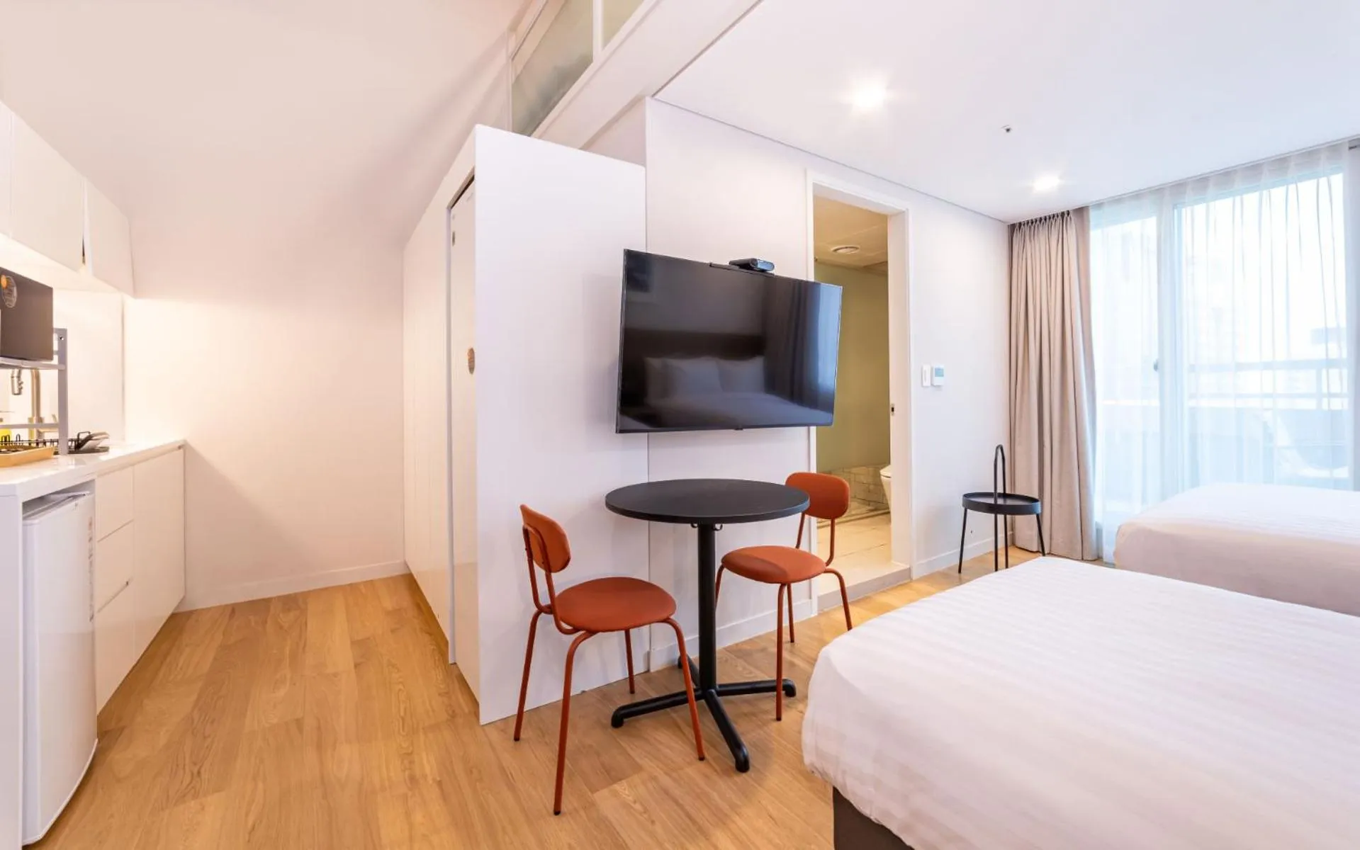 Bed in New Seoul Hotel Myeongdong