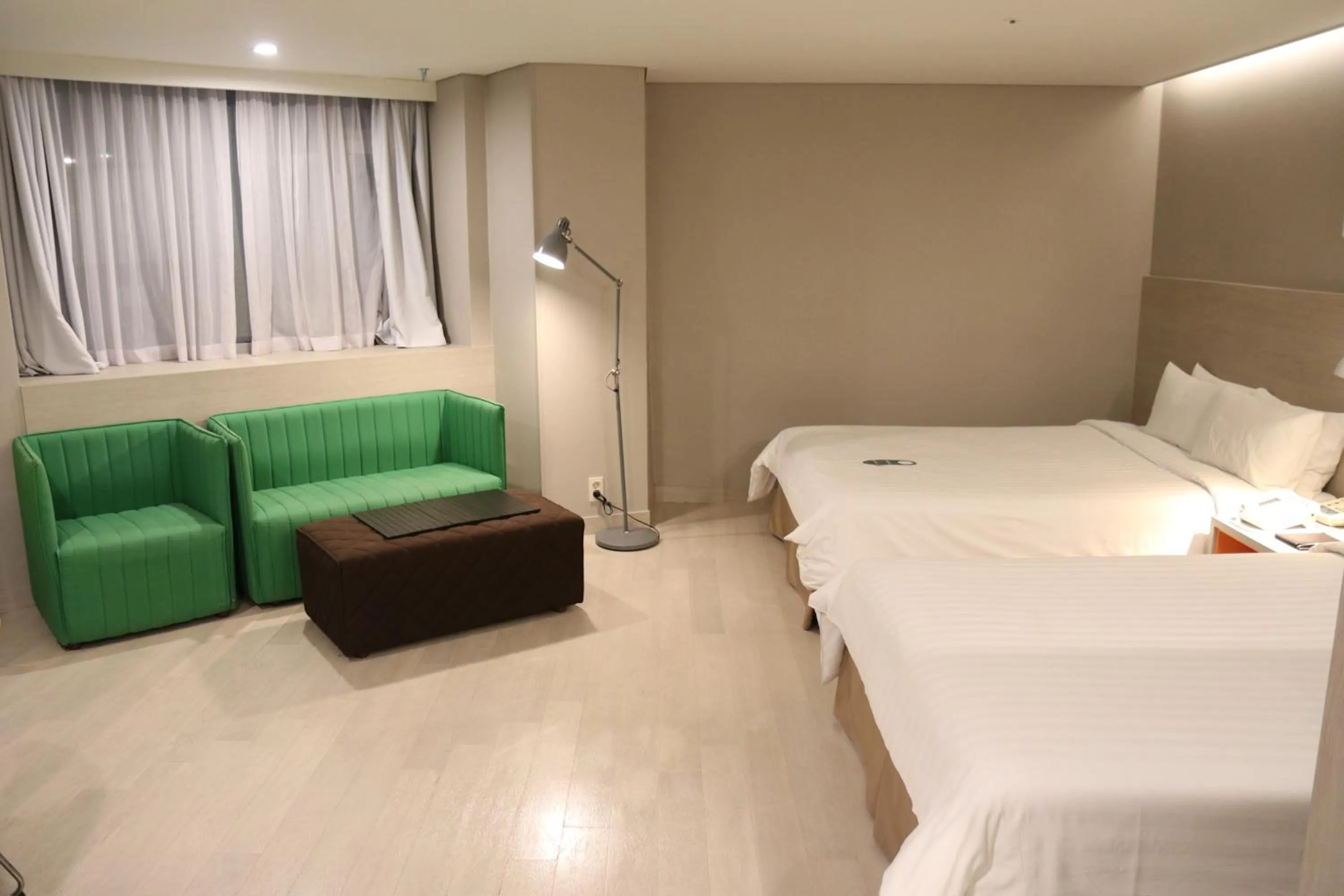 Bed in New Seoul Hotel Myeongdong