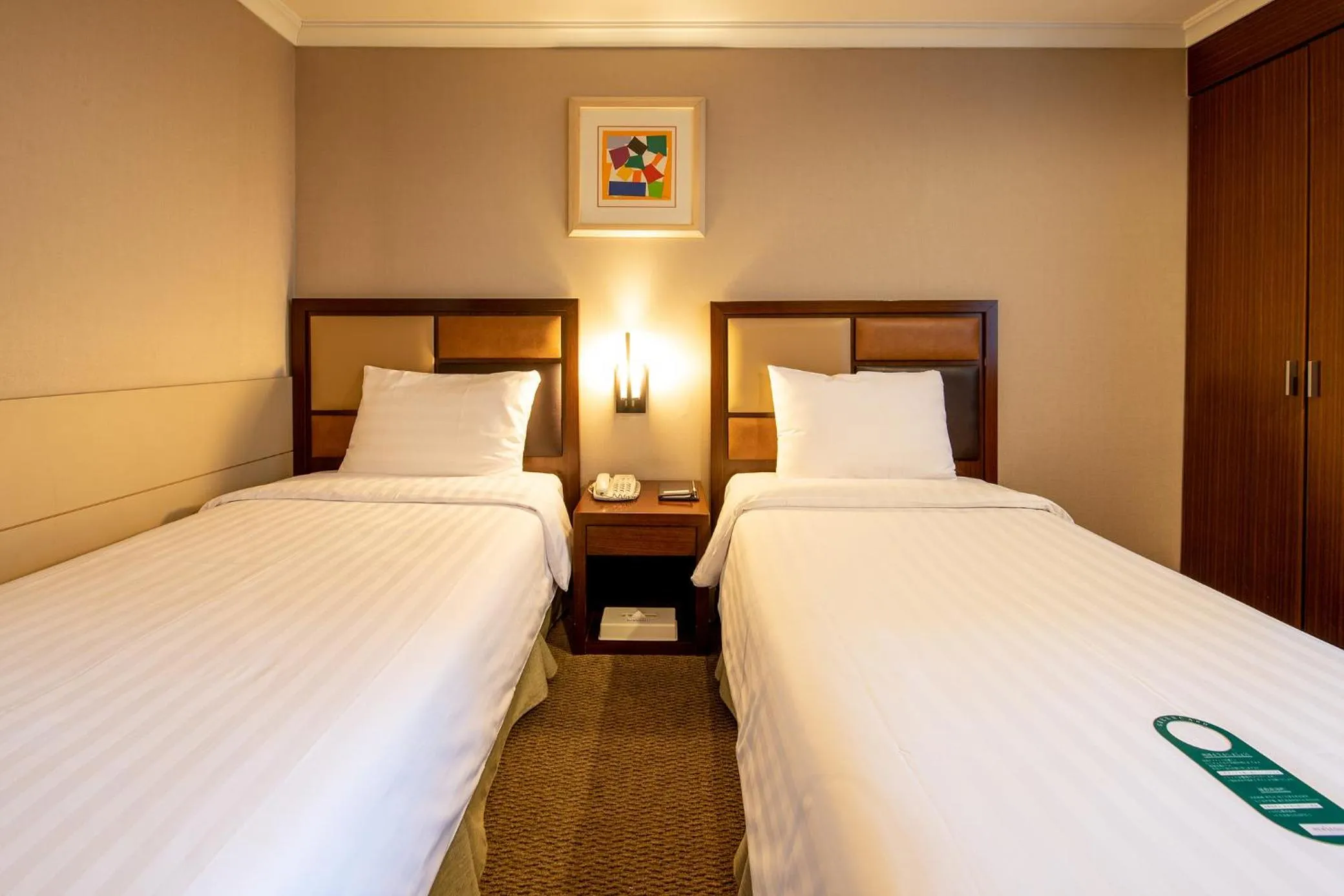 Bed in New Seoul Hotel Myeongdong