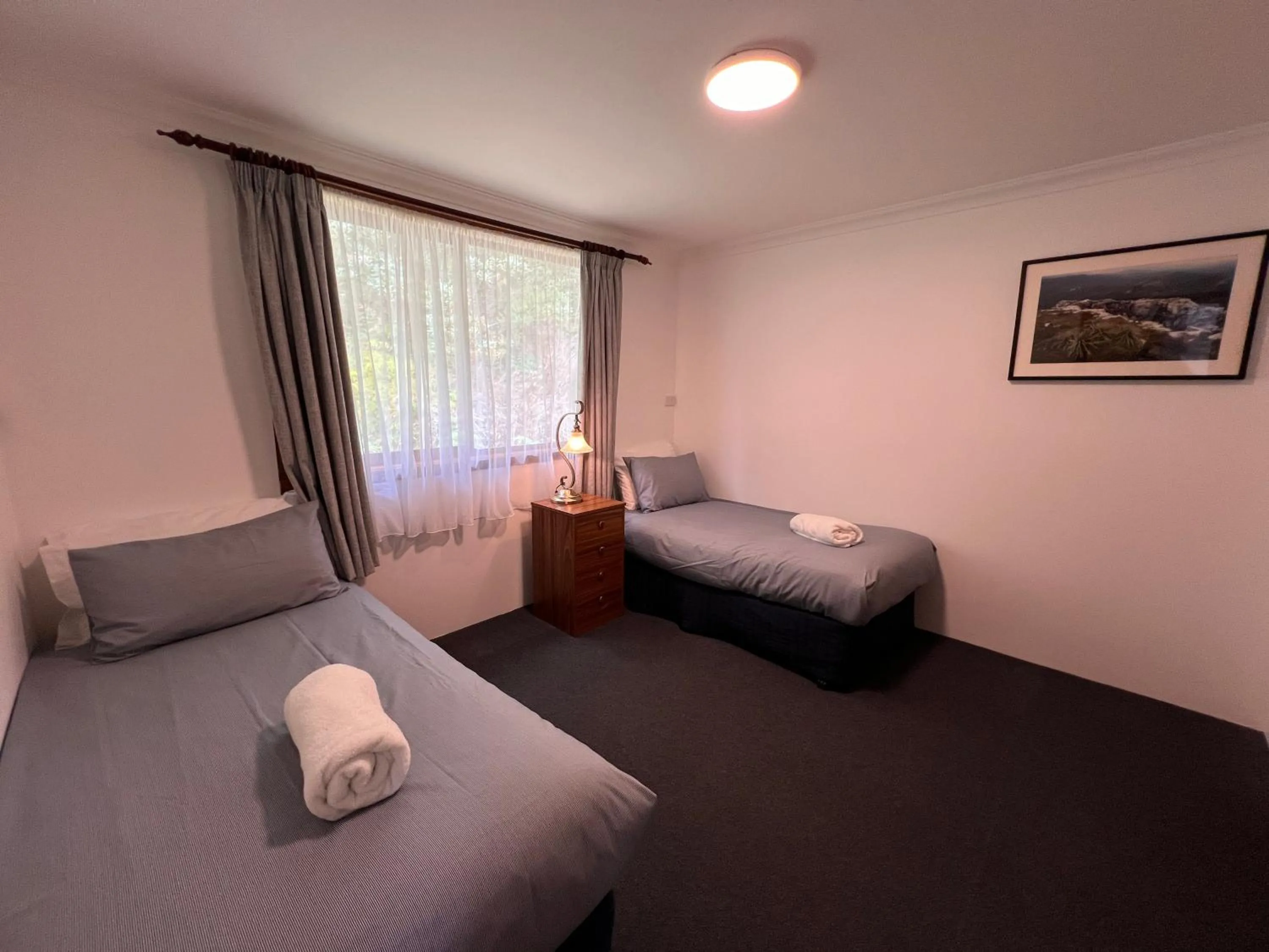 Bed in Regatta Point Tavern & Holiday Villas