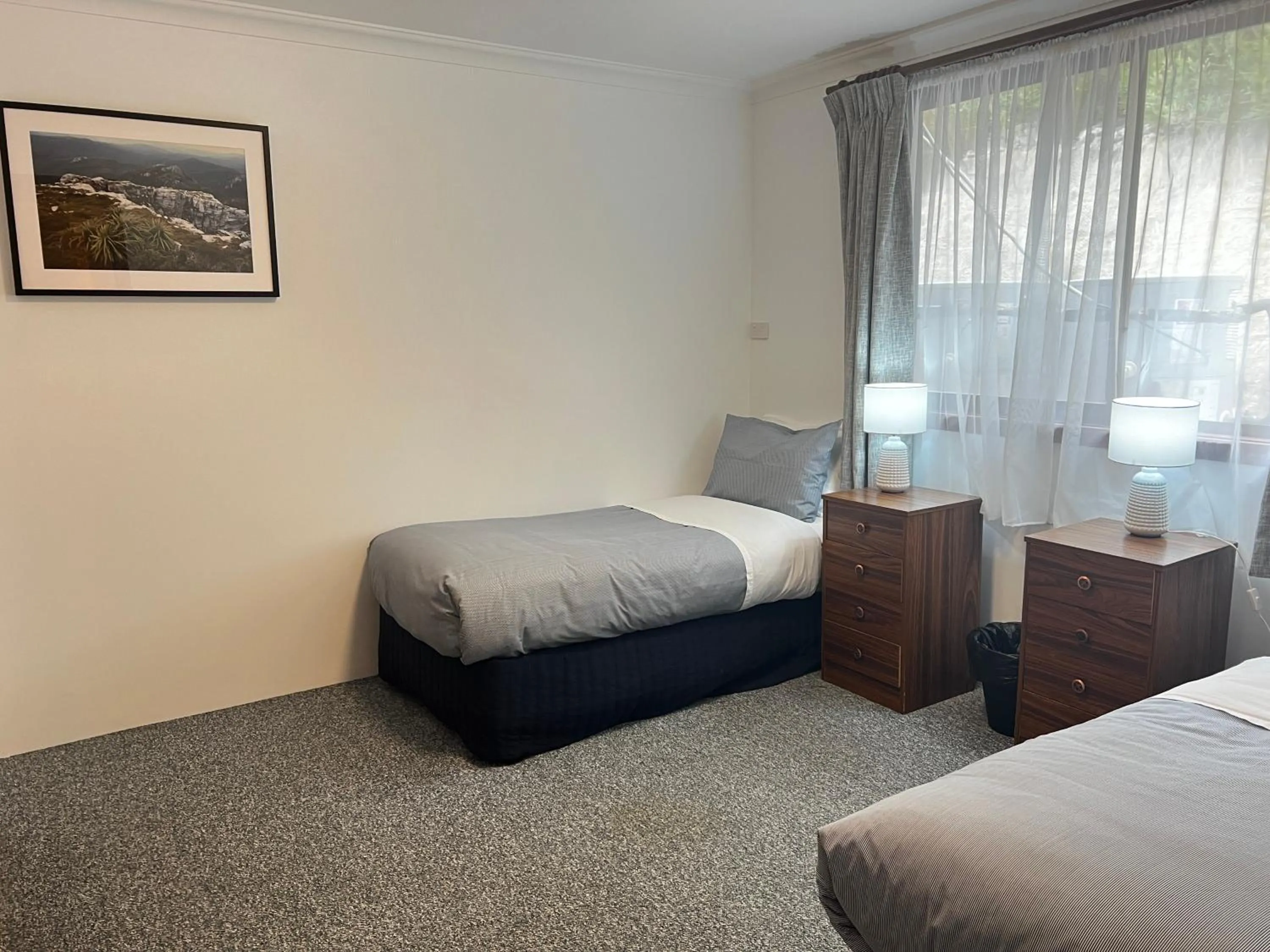 Bed in Regatta Point Tavern & Holiday Villas