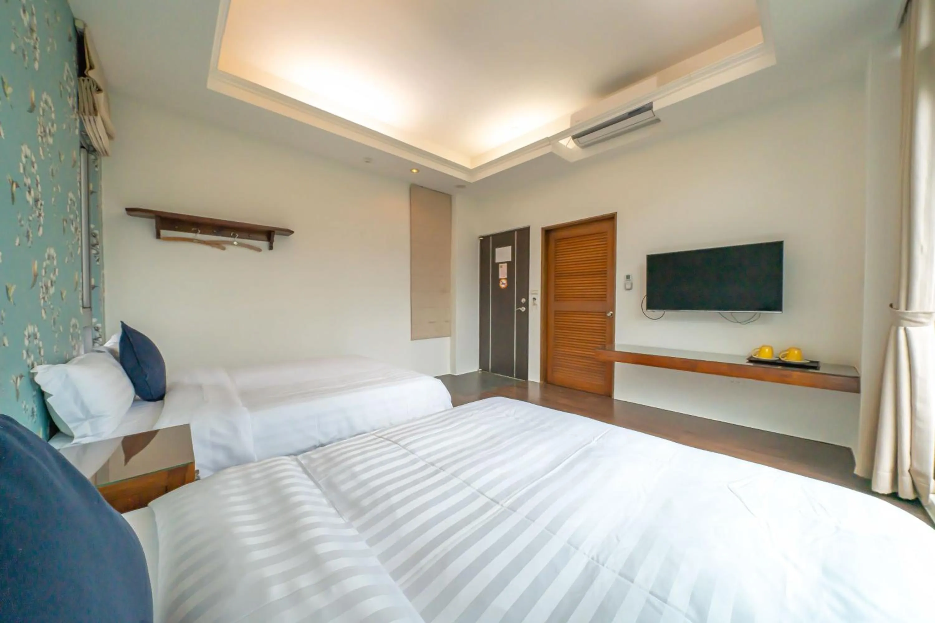 Bed in 美麗晨曦民宿-附停車位 近慈濟