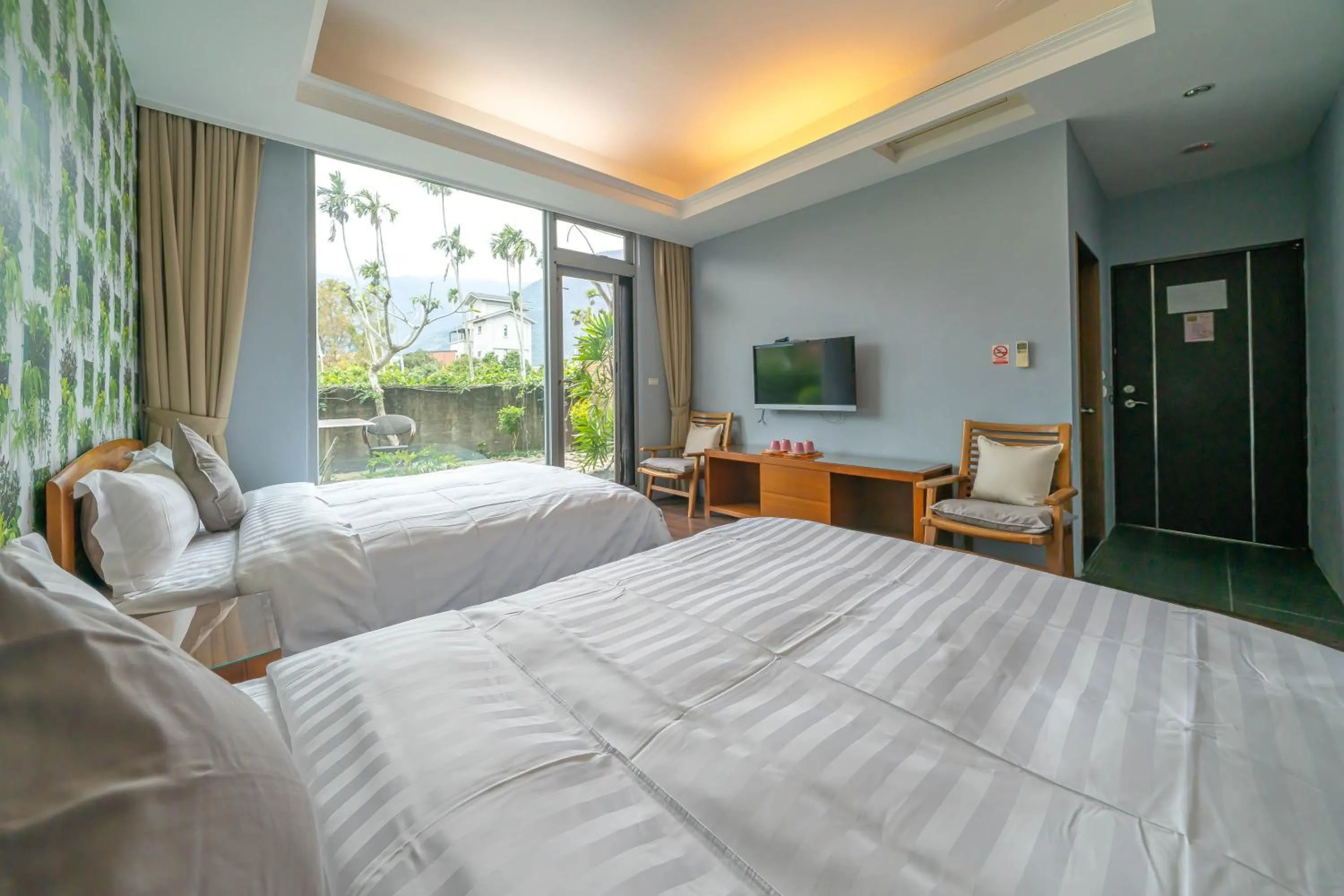 Bed in 美麗晨曦民宿-附停車位 近慈濟