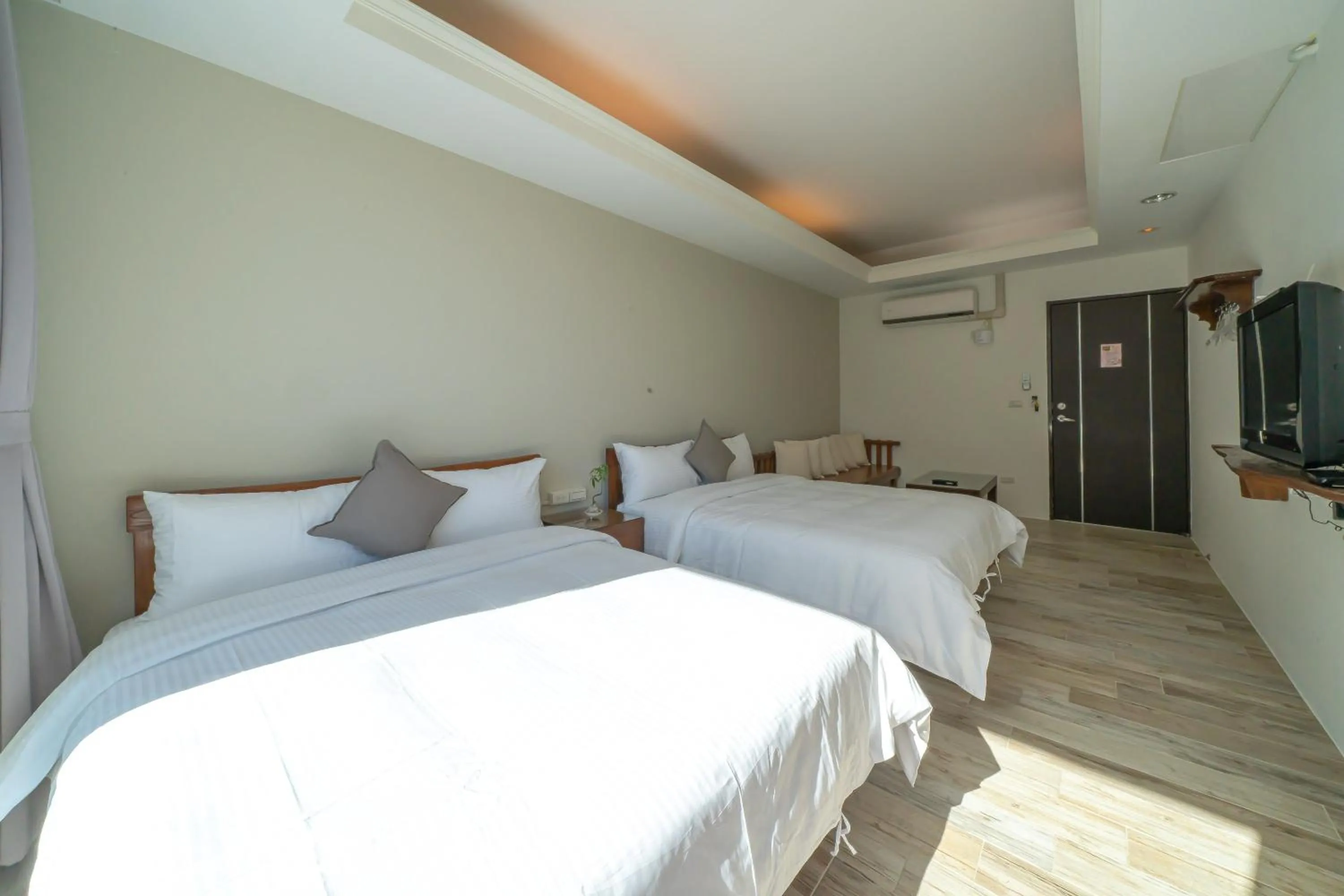 Bed in 美麗晨曦民宿-附停車位 近慈濟