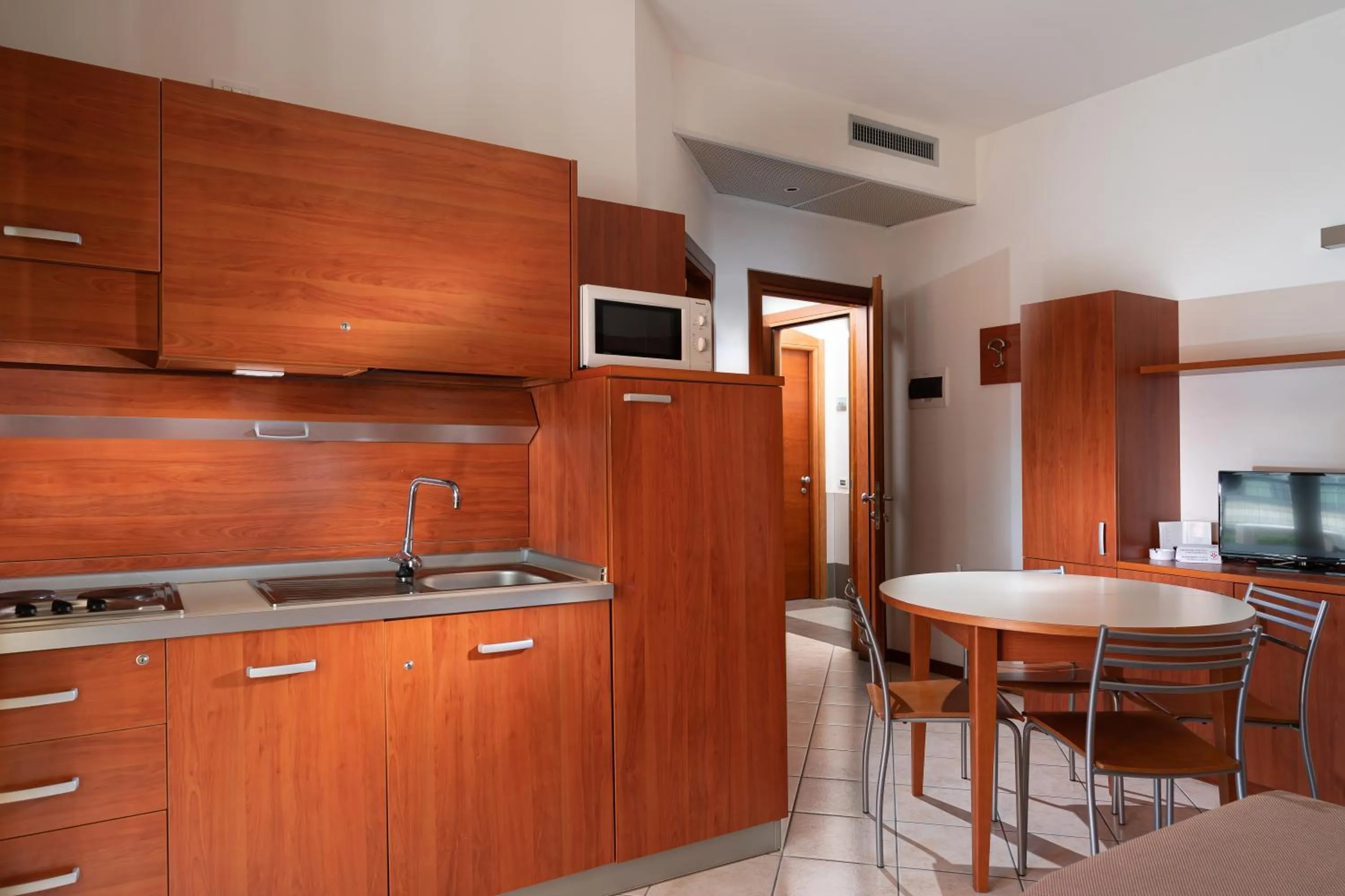 Kitchen or kitchenette in Hotel Sheila