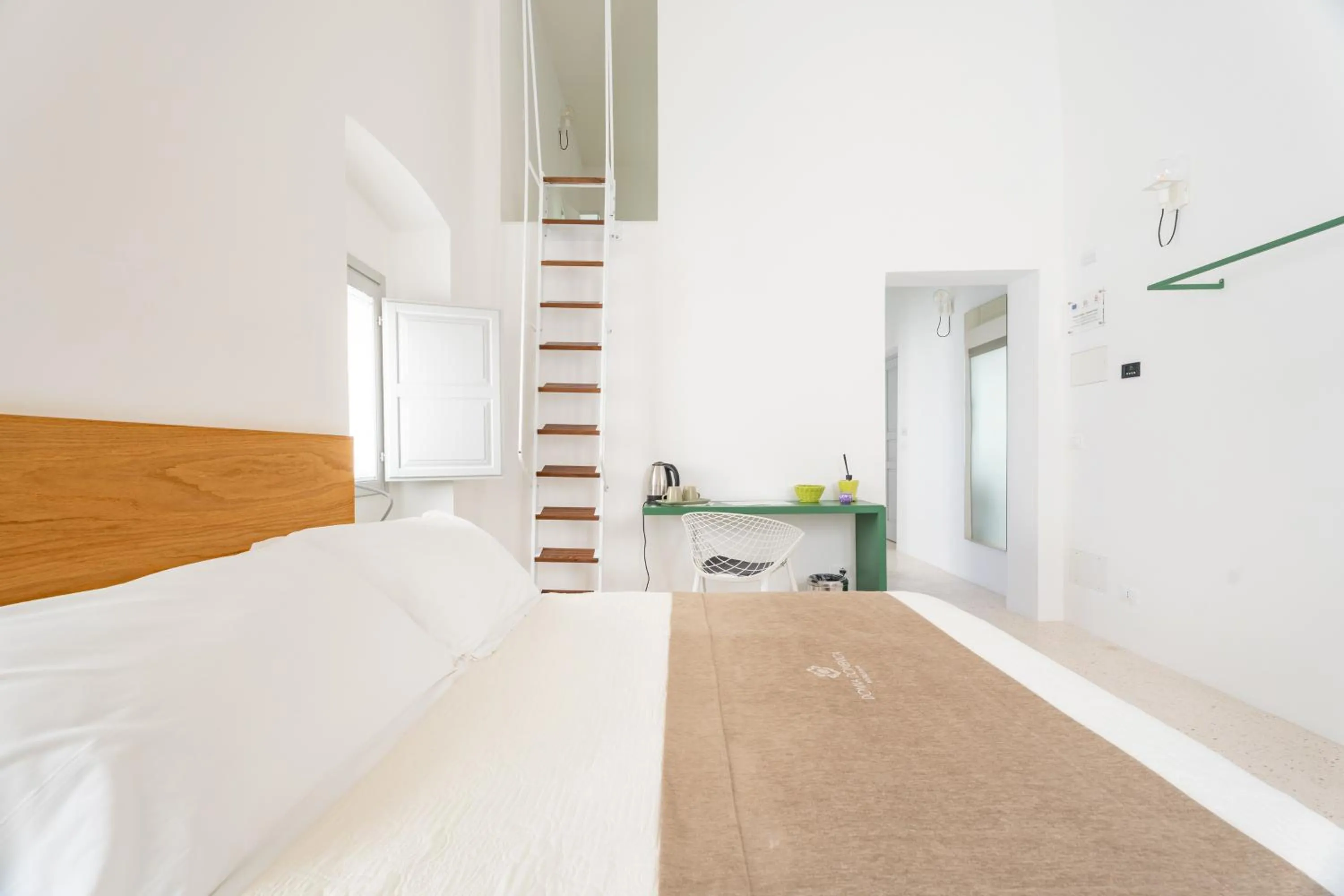 Bed in Donna Domenica Boutique Suites