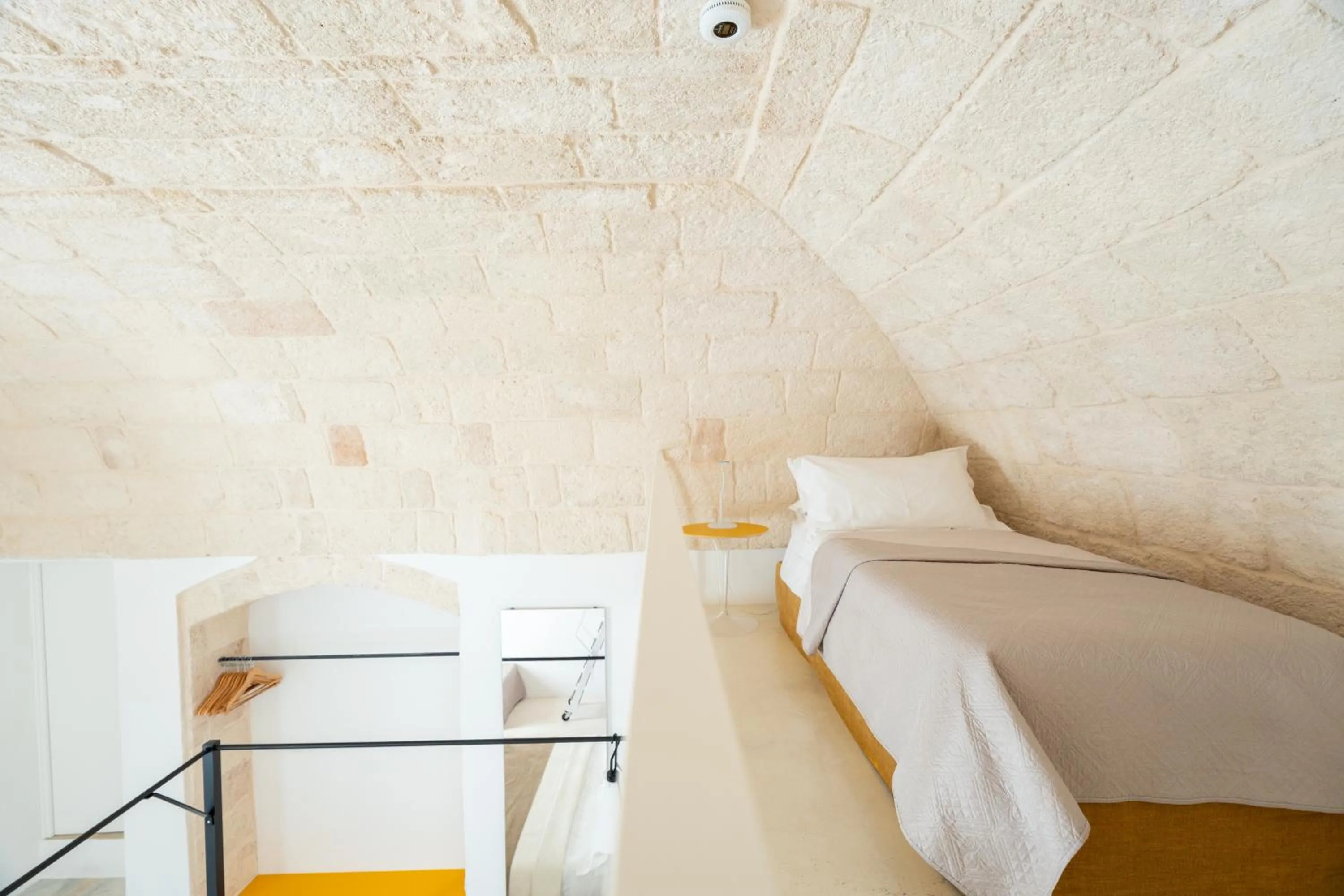 Bed in Donna Domenica Boutique Suites