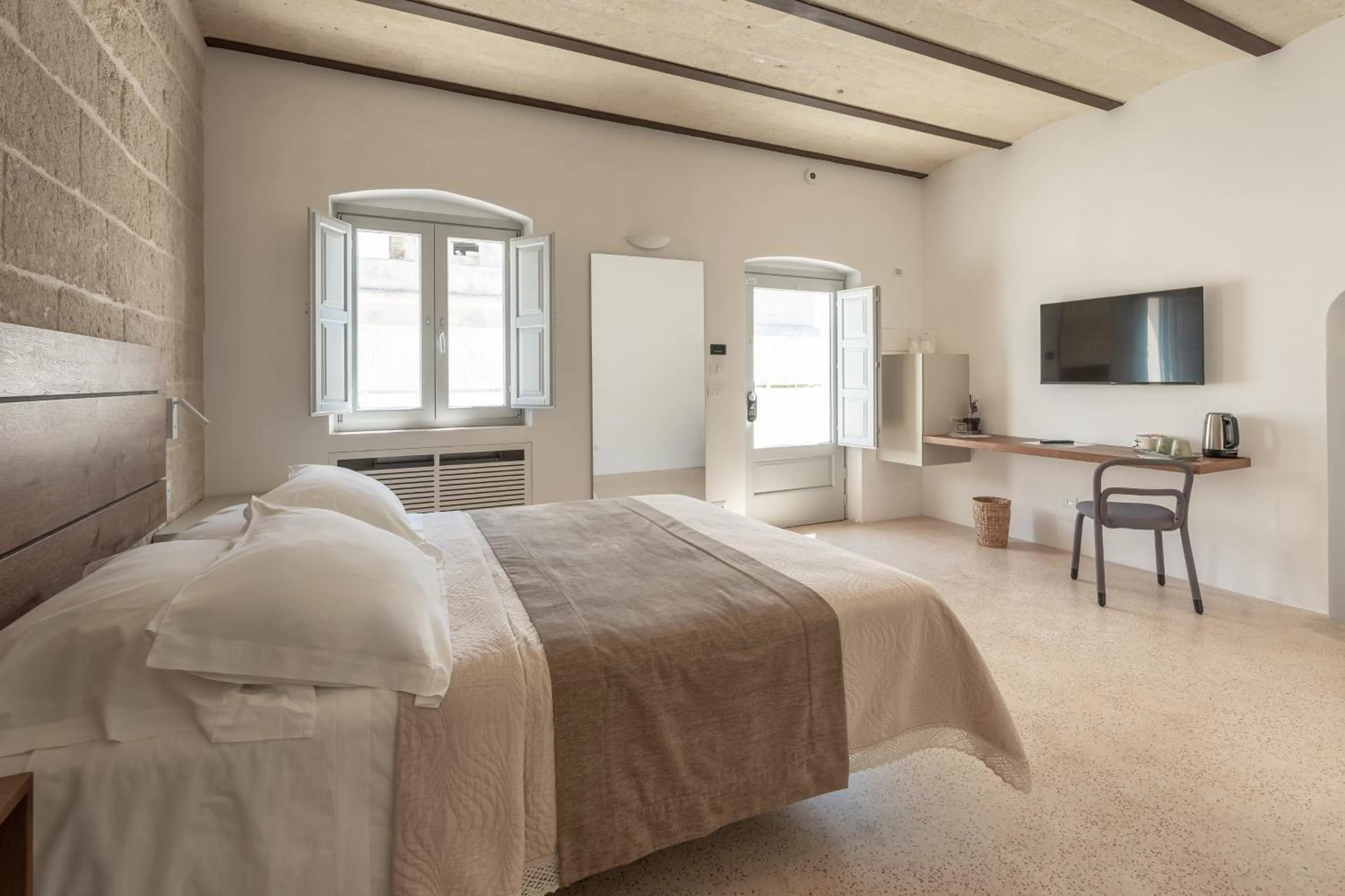 Bed in Donna Domenica Boutique Suites