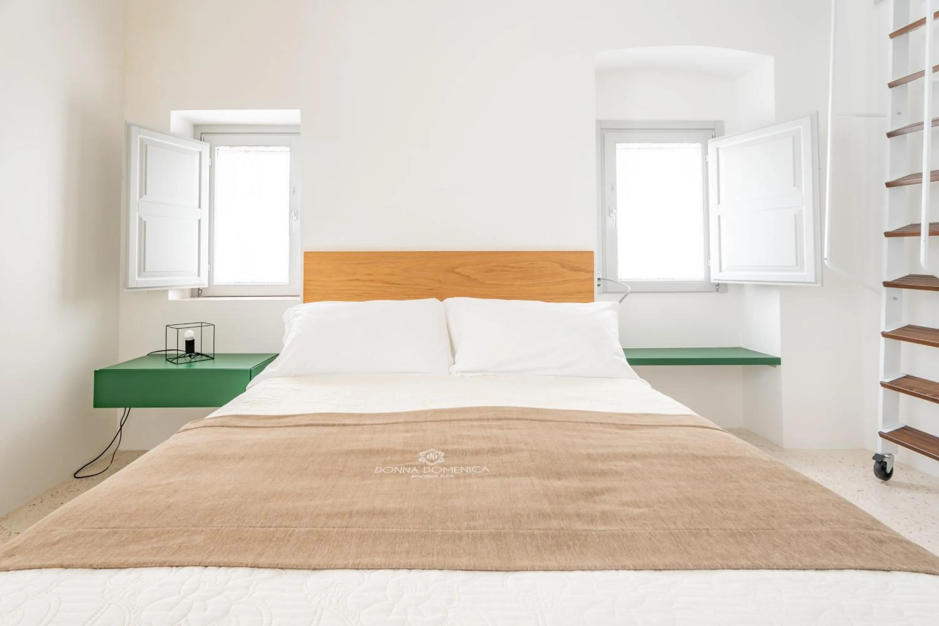 Bed in Donna Domenica Boutique Suites