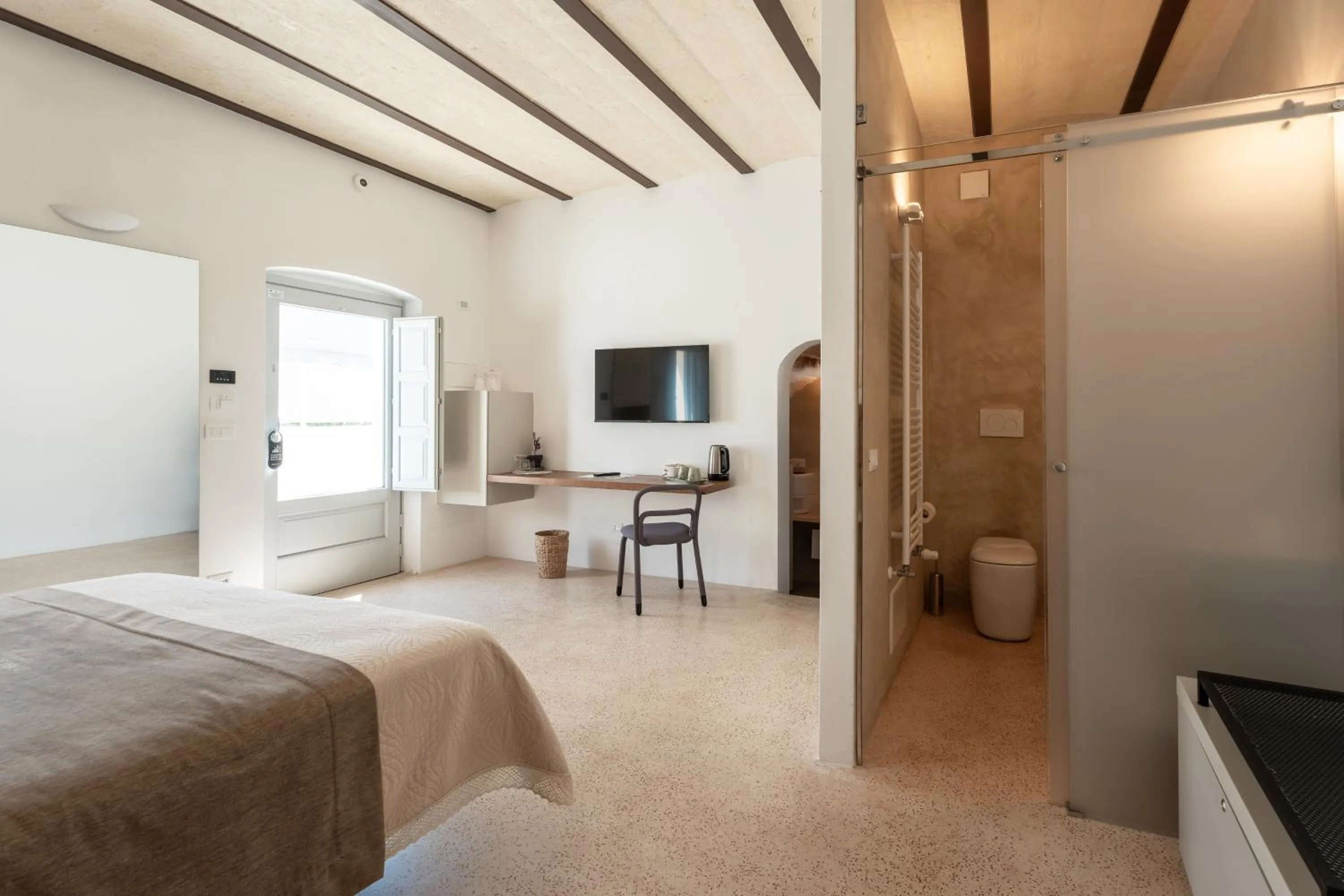 Bed in Donna Domenica Boutique Suites