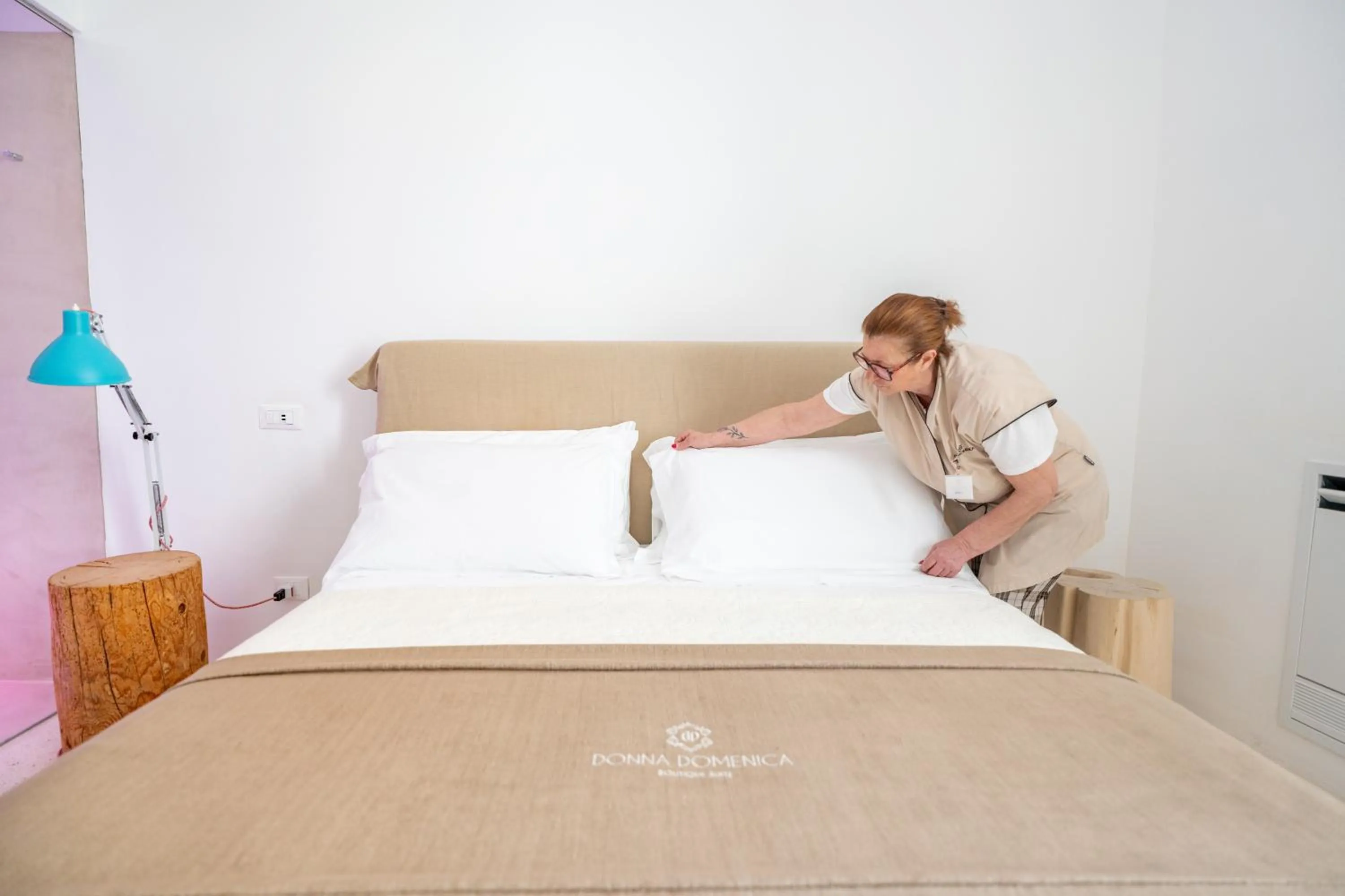 Bed in Donna Domenica Boutique Suites