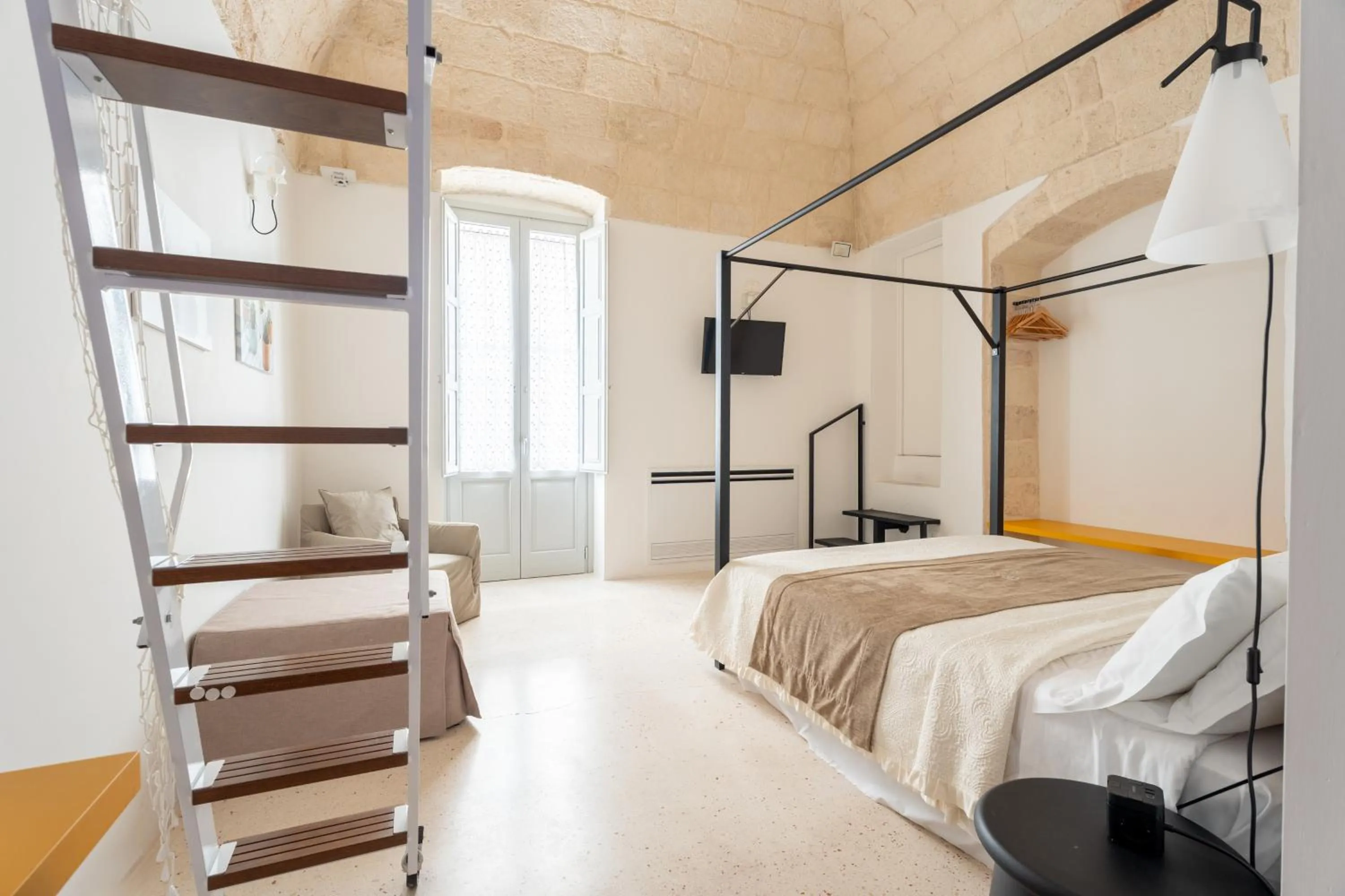 Bed in Donna Domenica Boutique Suites