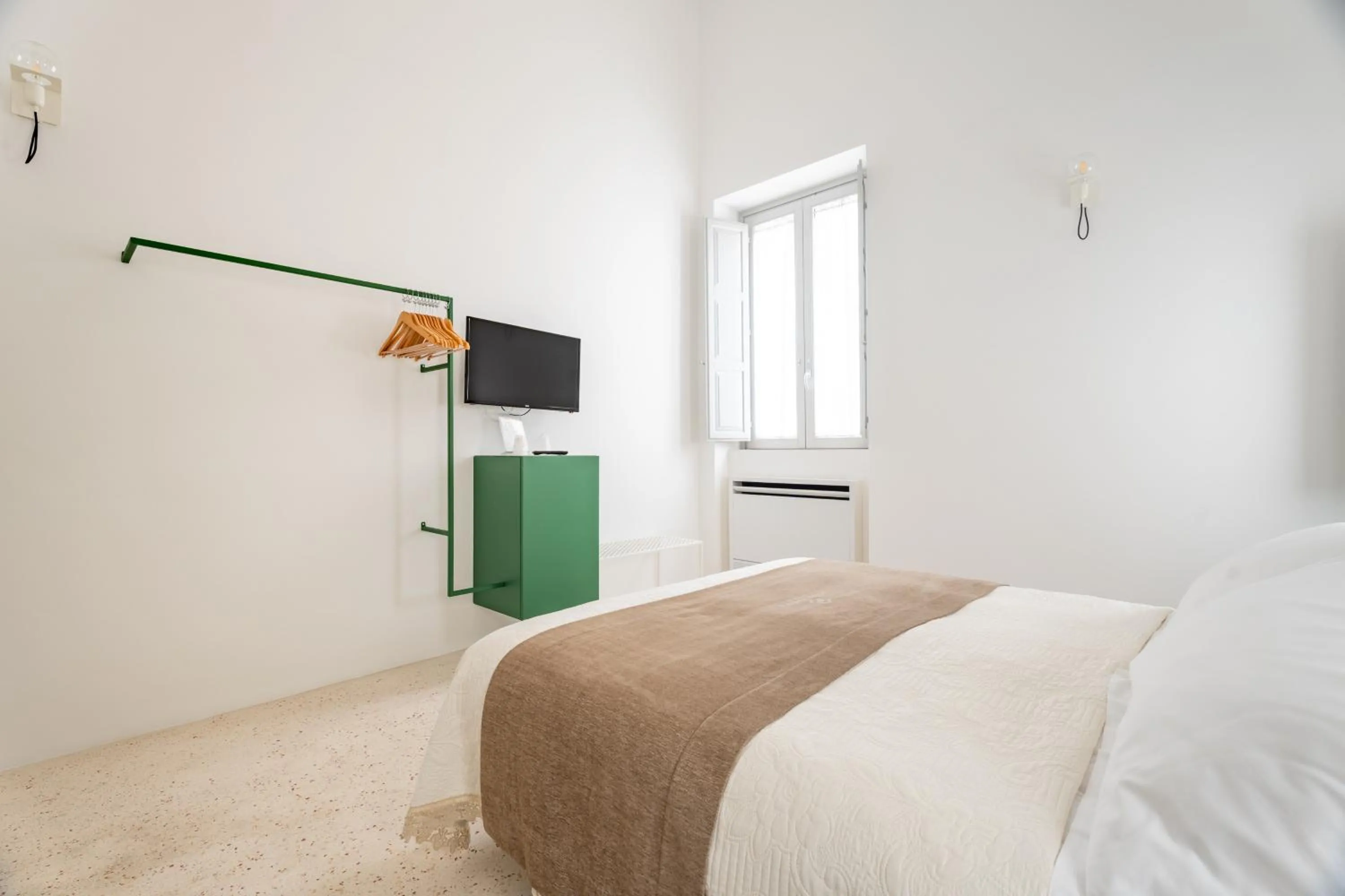 Bed in Donna Domenica Boutique Suites