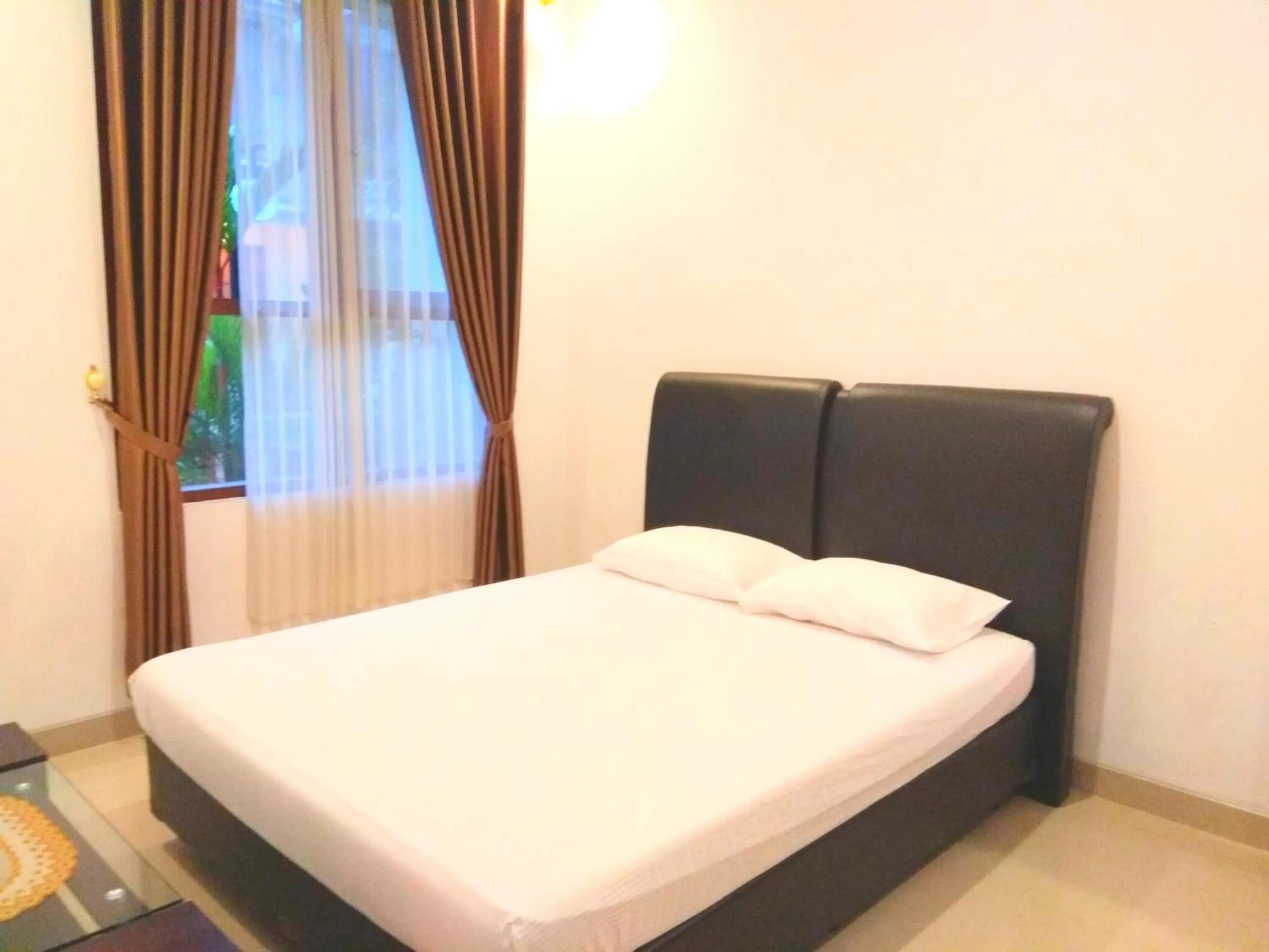 Bedroom, Bed in Fams Homestay by FH Stay