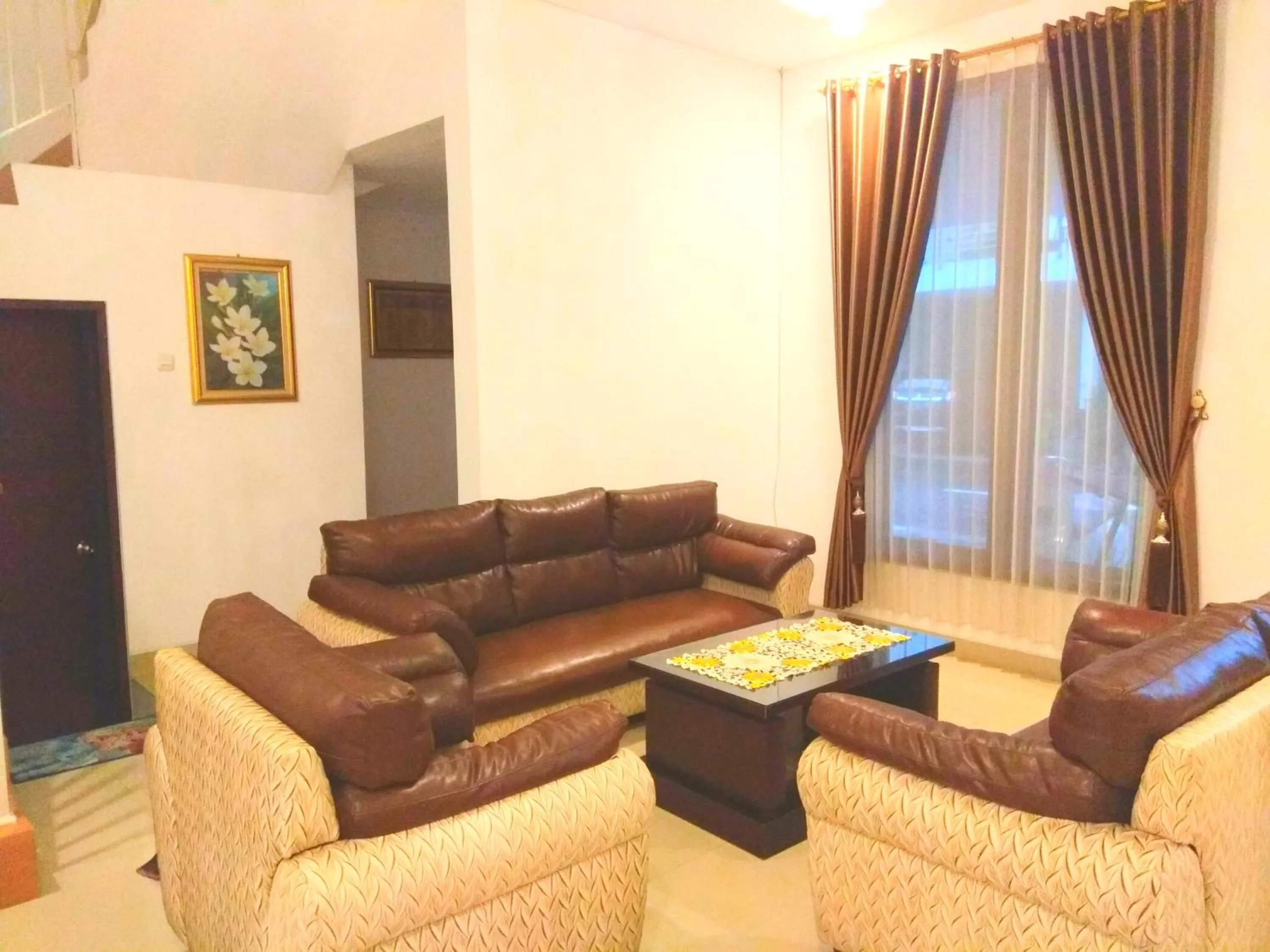 Living room in Fams Homestay by FH Stay