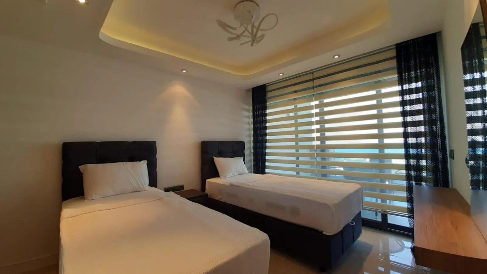 Bed in Elite Luxury Suite & Spa