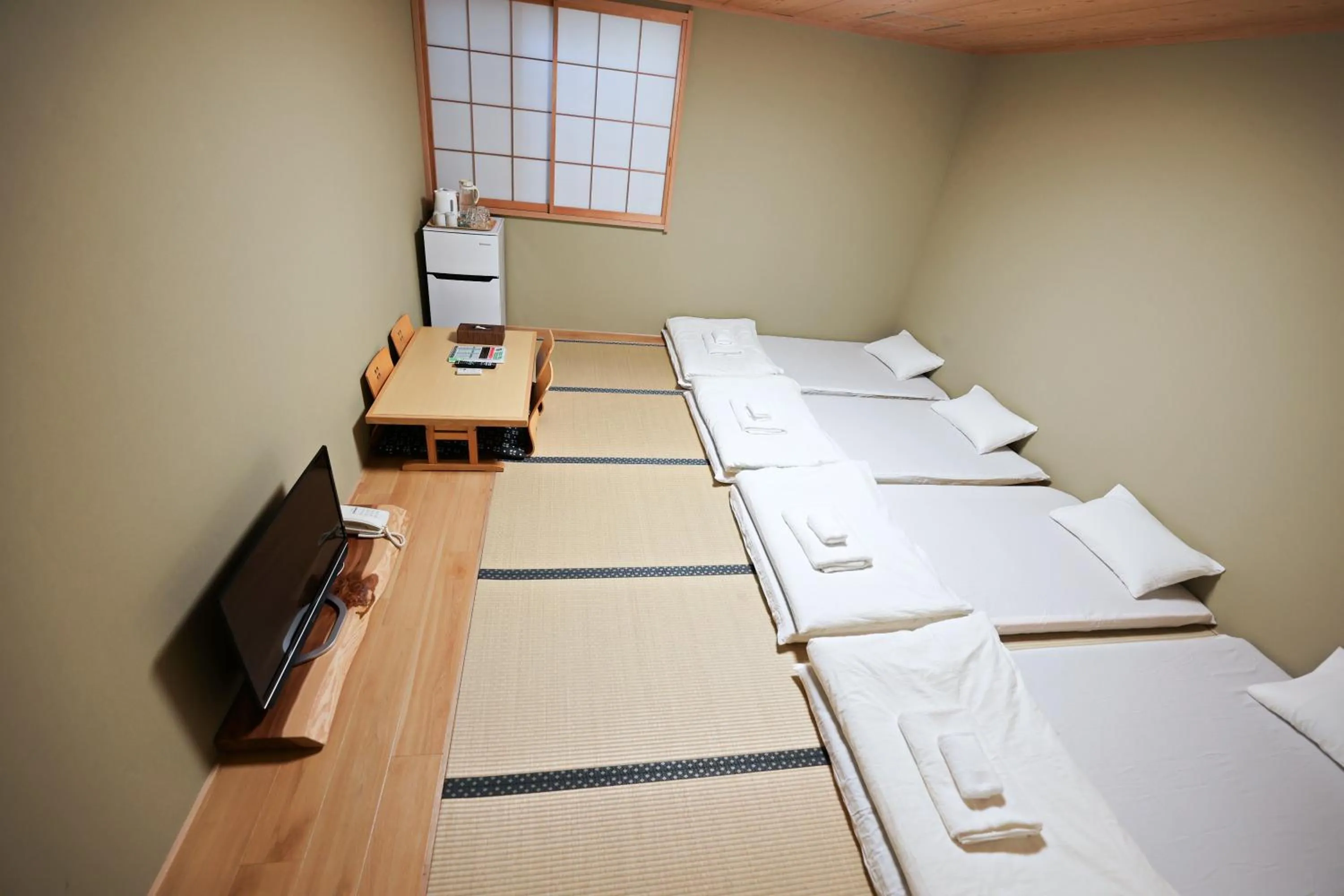 Bed in Akihabara Nakagawa Inn