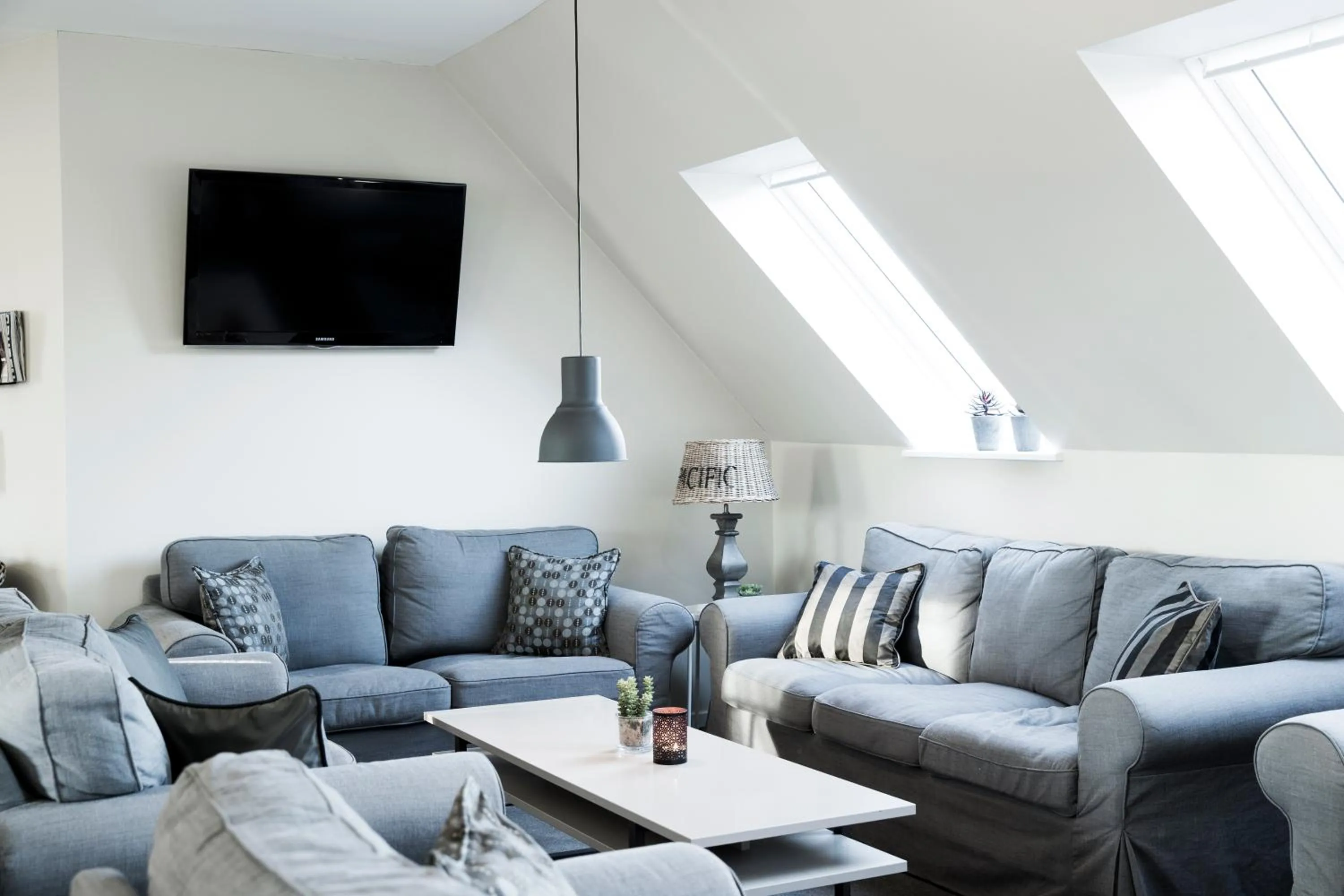 Communal lounge/ TV room in Skjalm Hvide Hotel