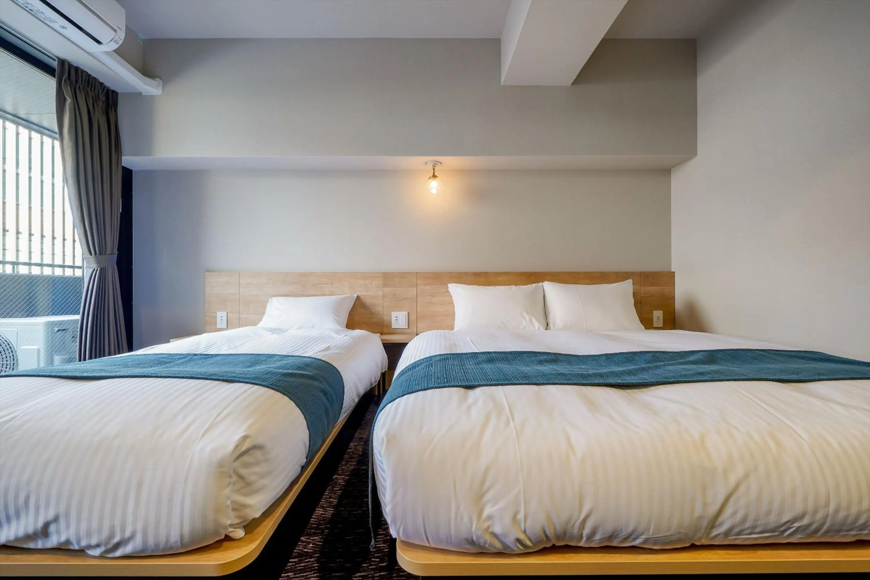 Bed in RESI STAY Heart