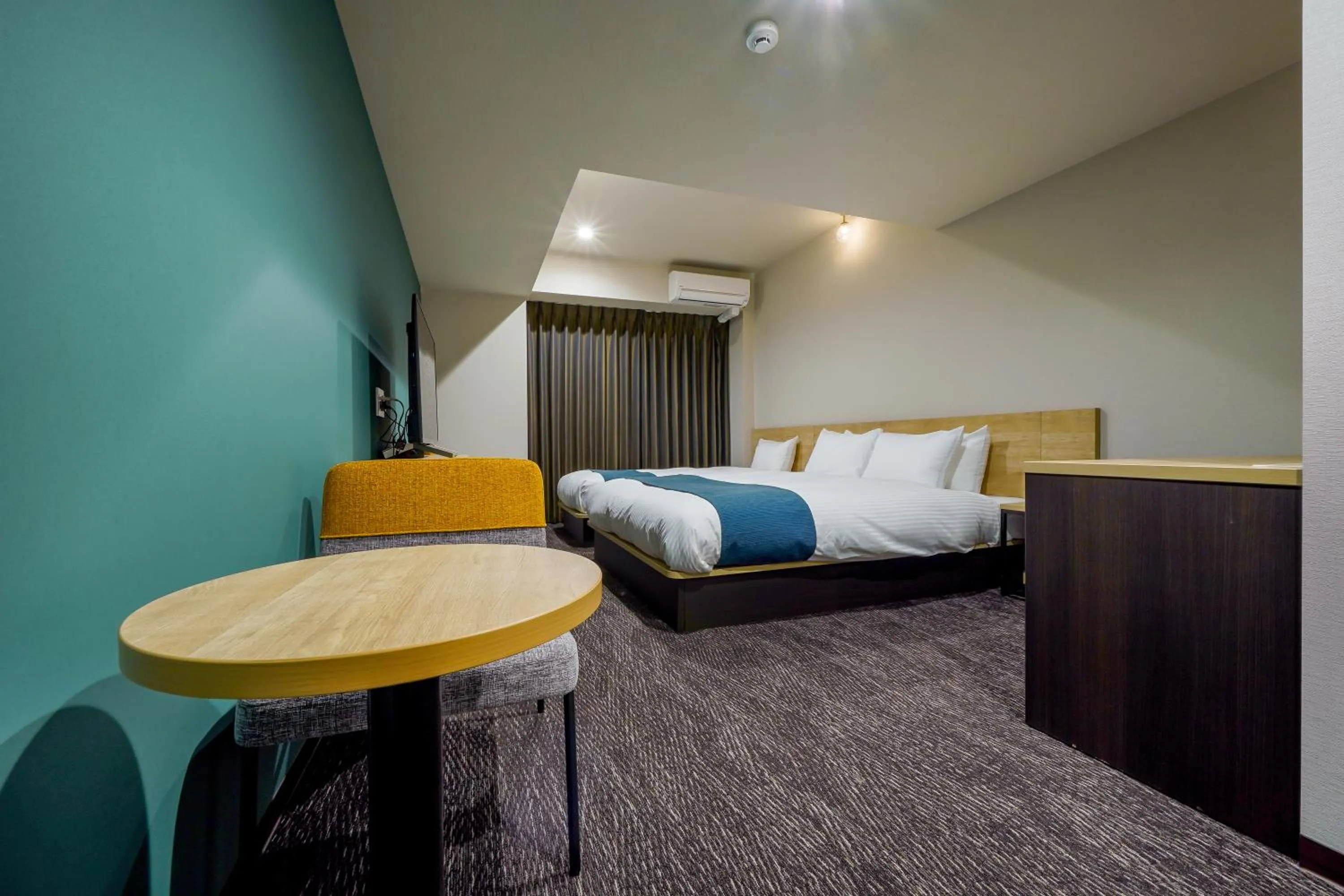 Bed in RESI STAY Heart