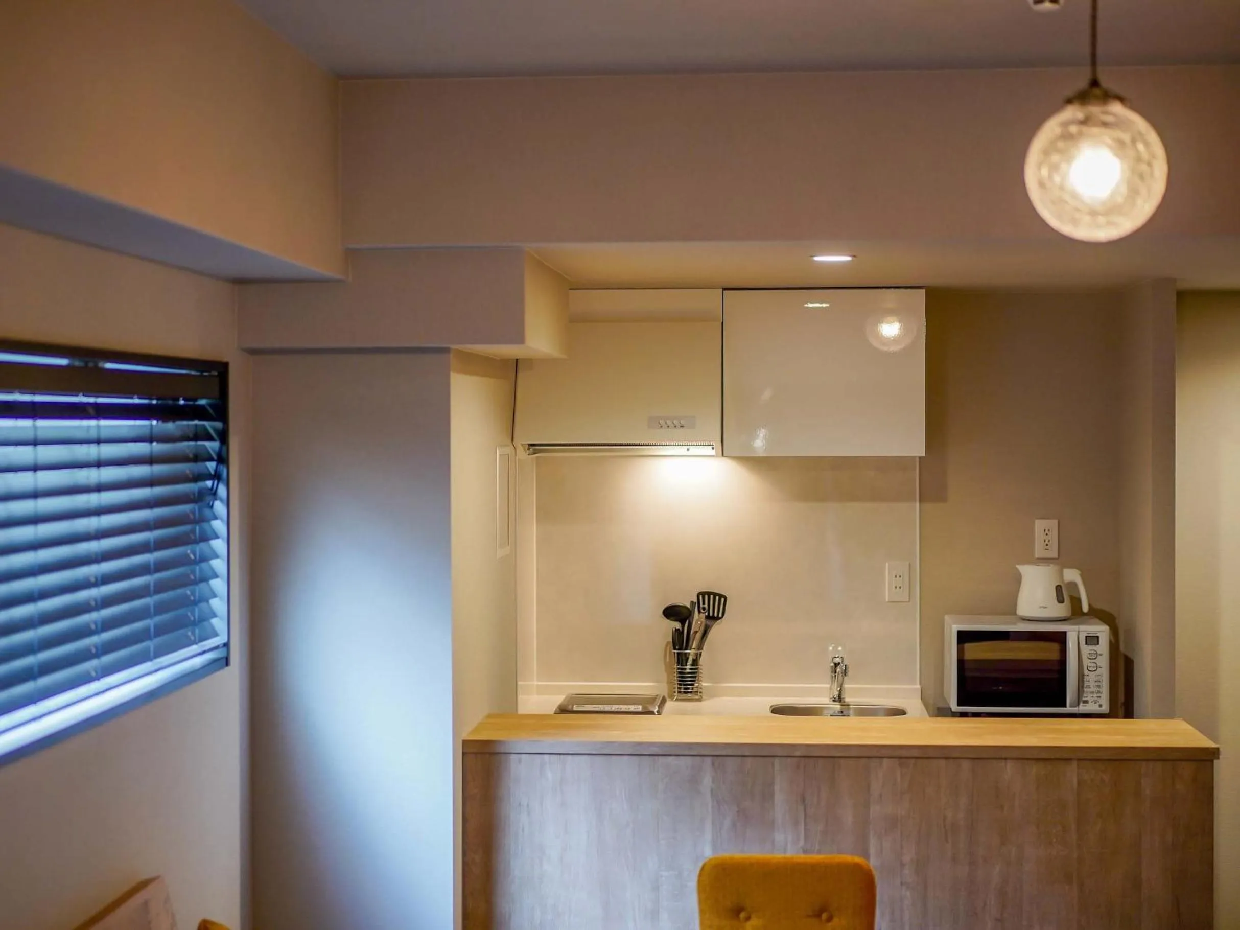 Kitchen or kitchenette in RESI STAY Heart