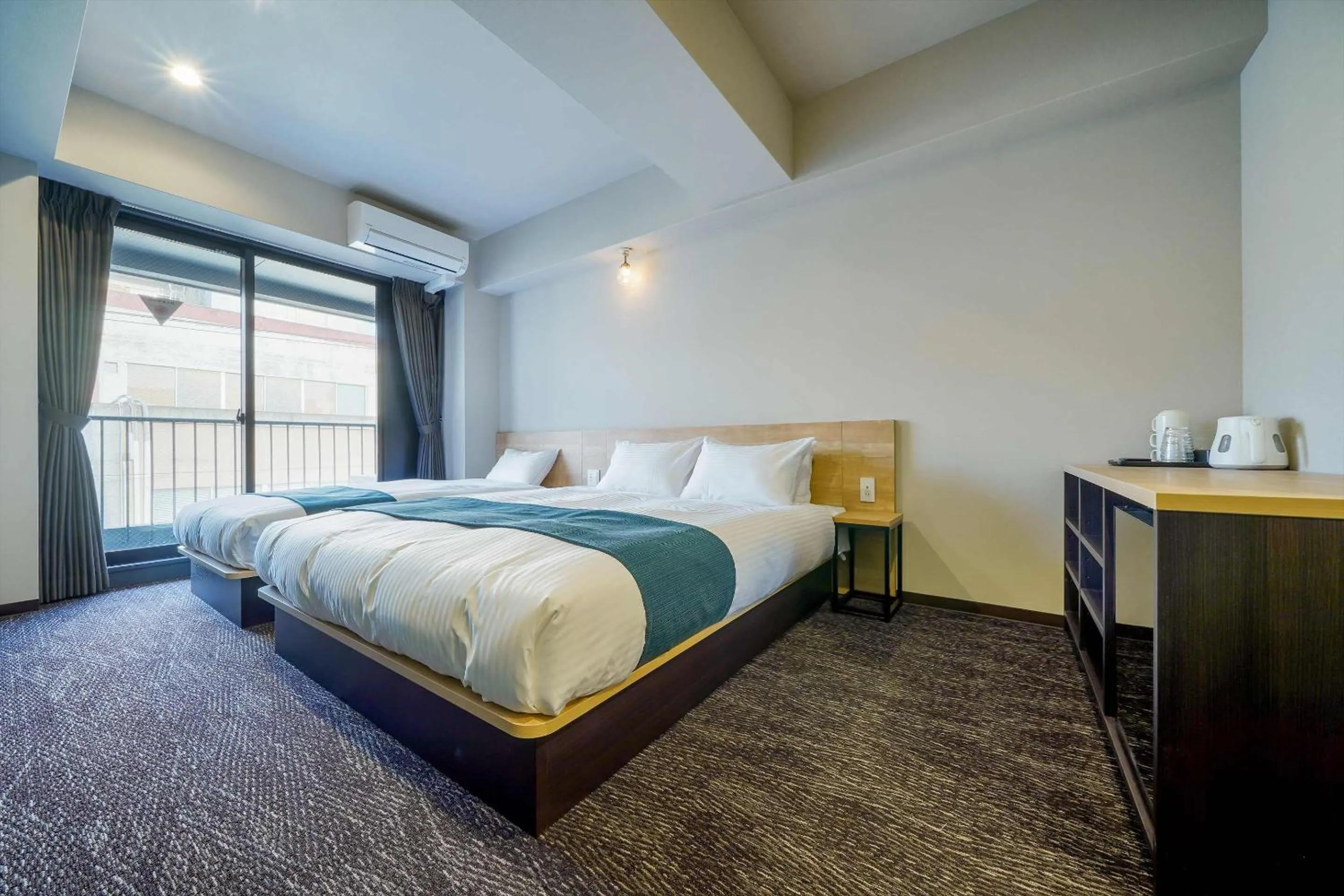 Bed in RESI STAY Heart