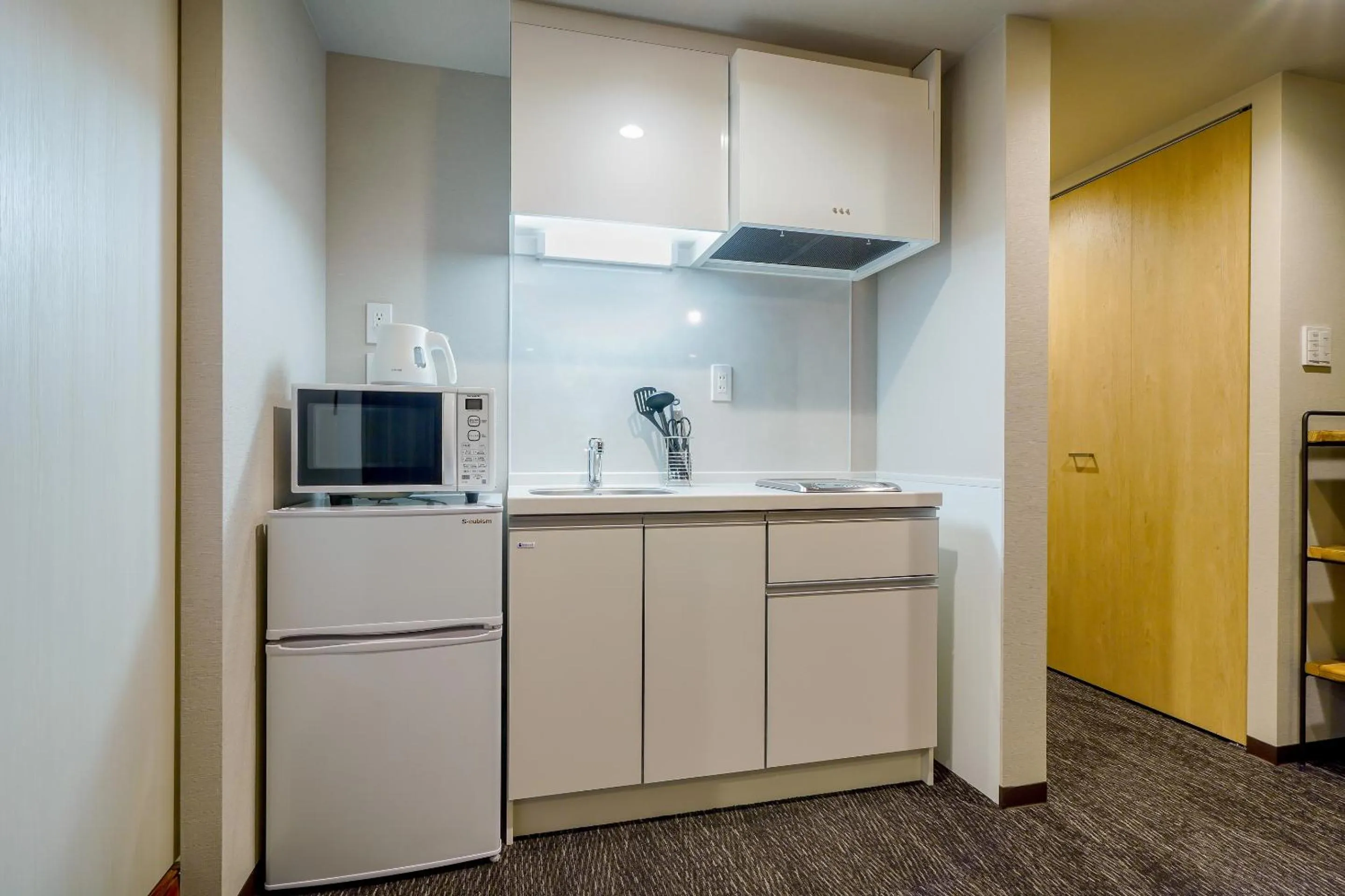 Kitchen or kitchenette in RESI STAY Heart