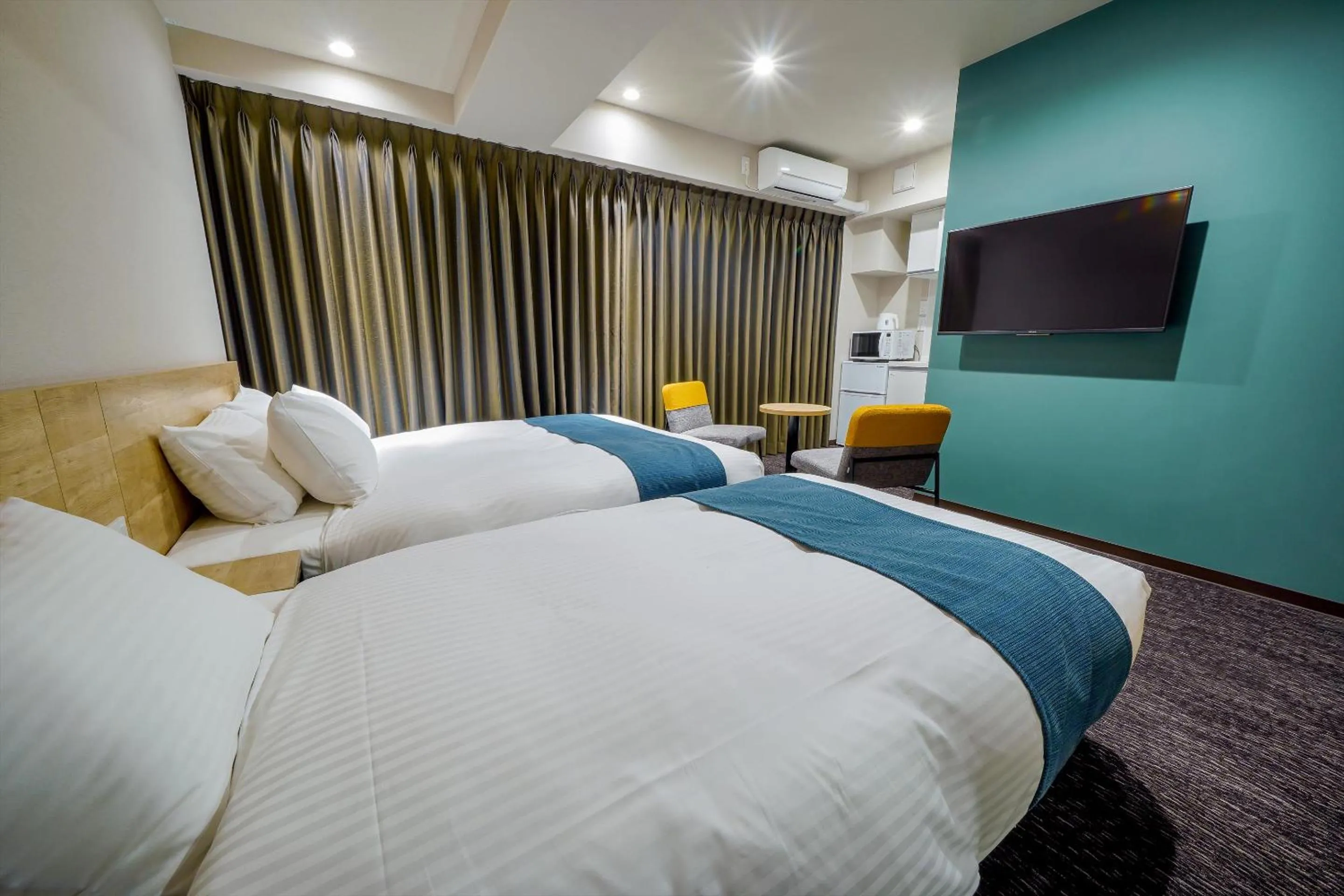 Bed in RESI STAY Heart