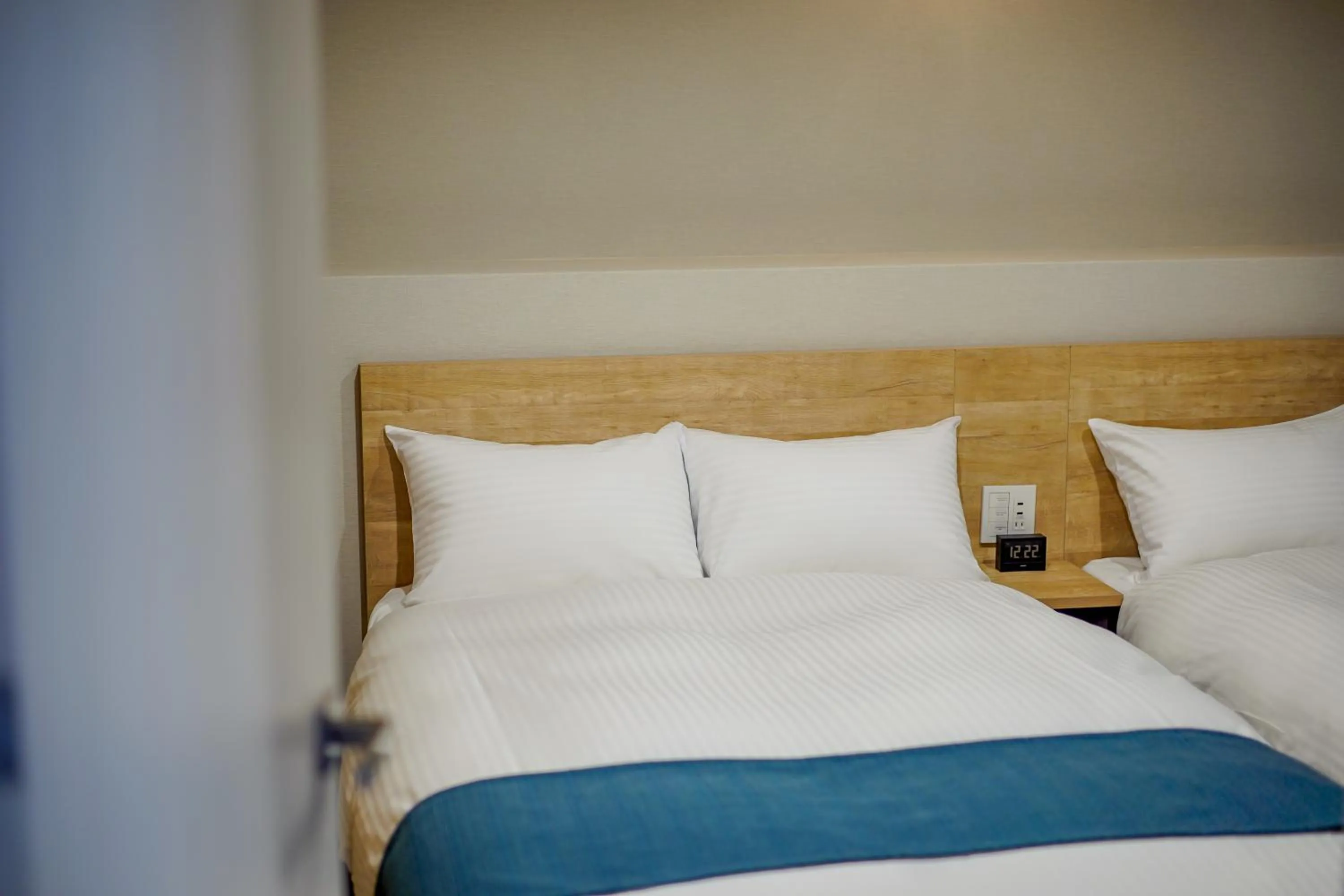 Bed in RESI STAY Heart