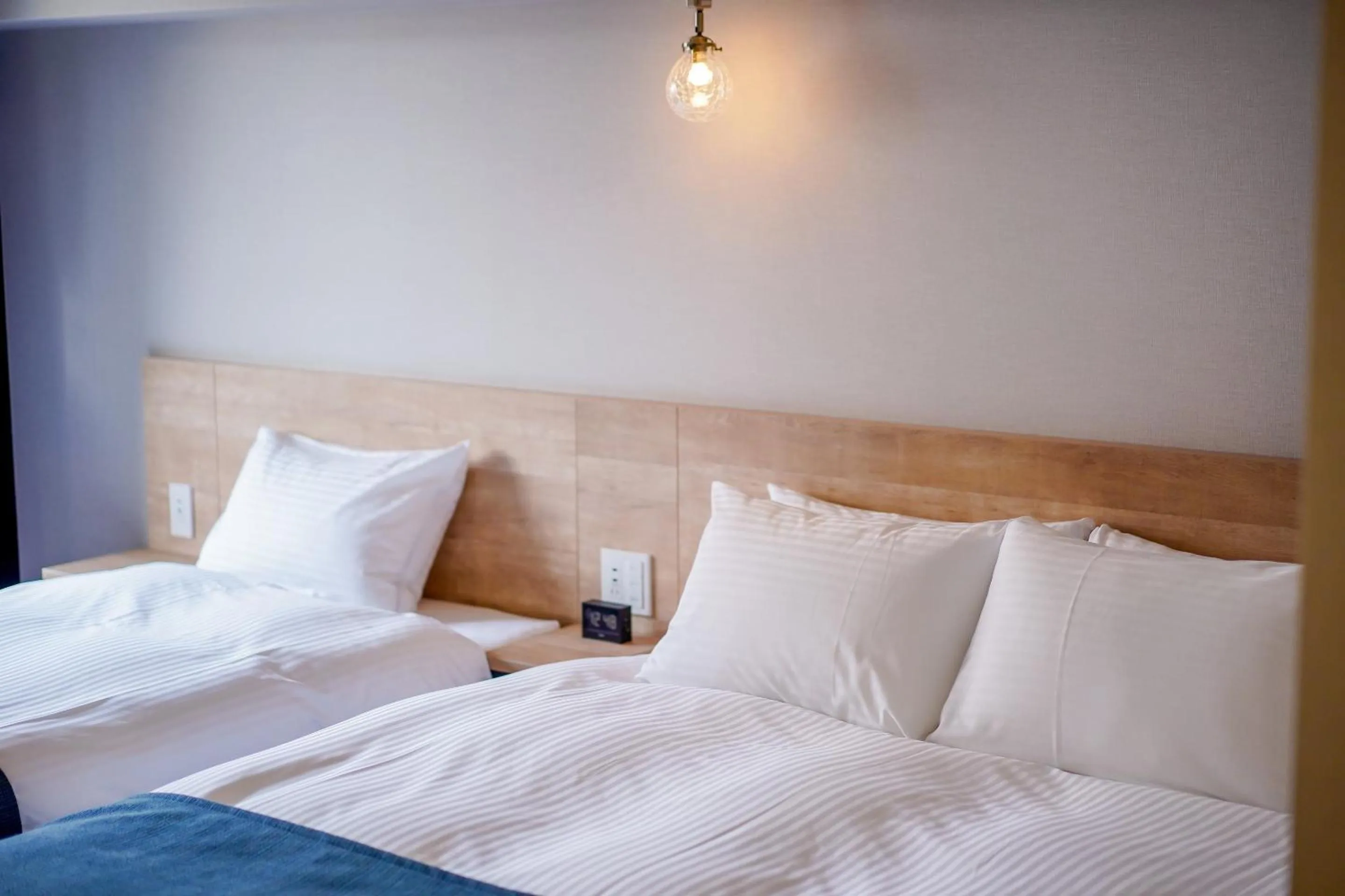 Bed in RESI STAY Heart