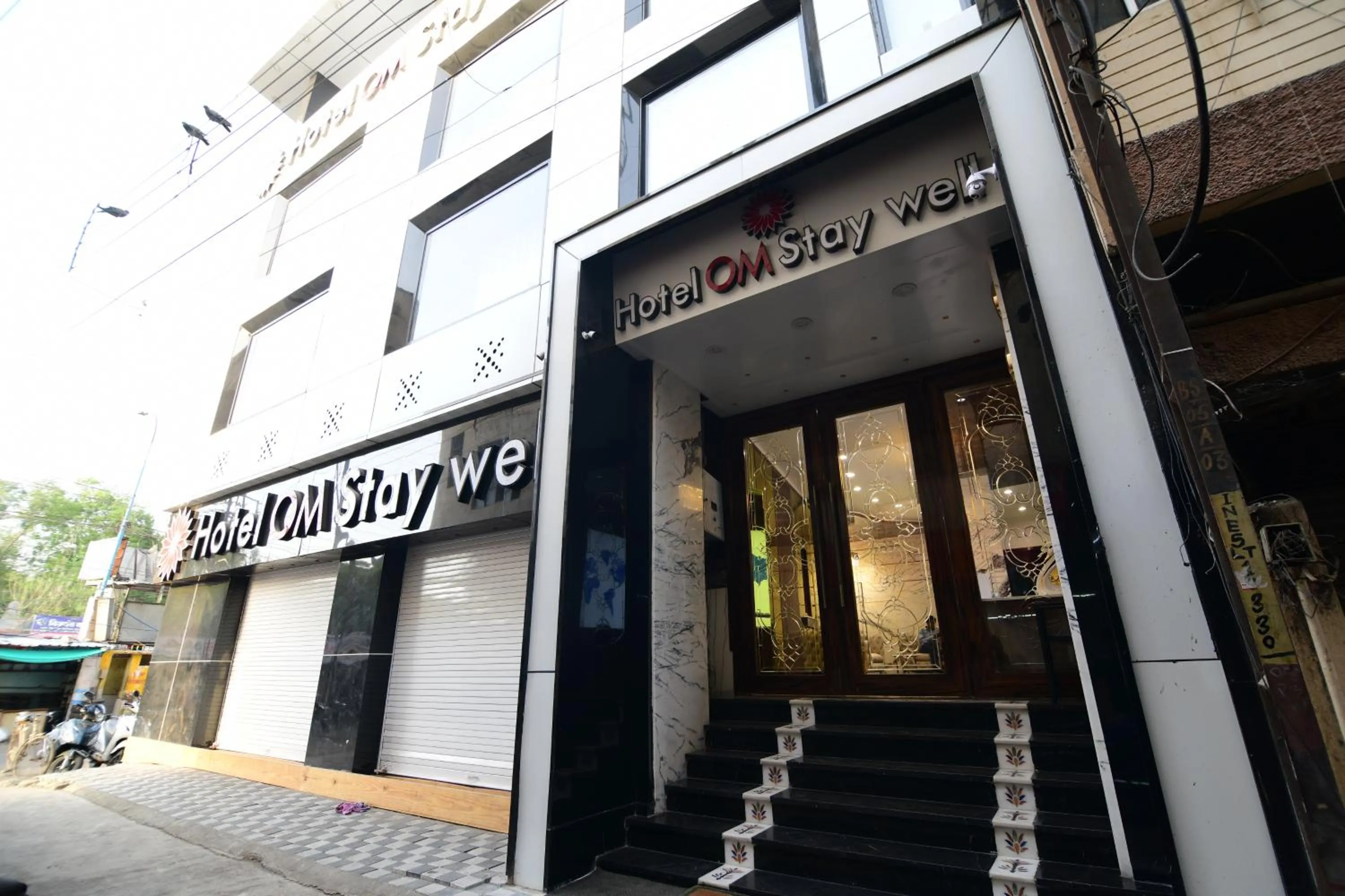 Property building in Hotel Om Stay Well