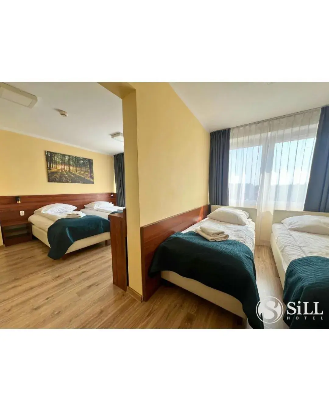 Standard Quadruple Room in Hotel SiLL Standard Quadruple Room in Hotel SiLL