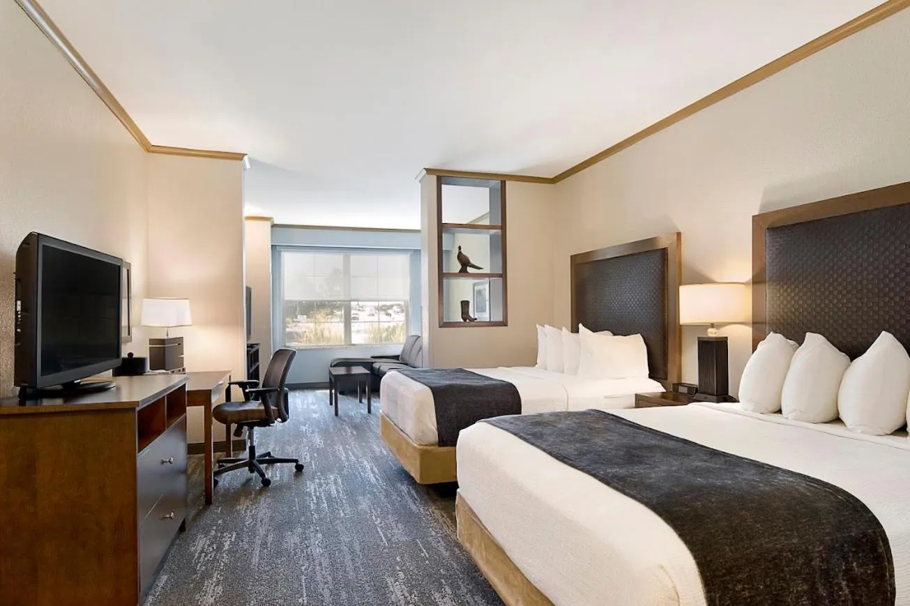 Bed in ClubHouse Hotel and Suites