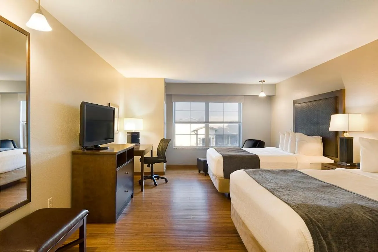 Bed in ClubHouse Hotel and Suites