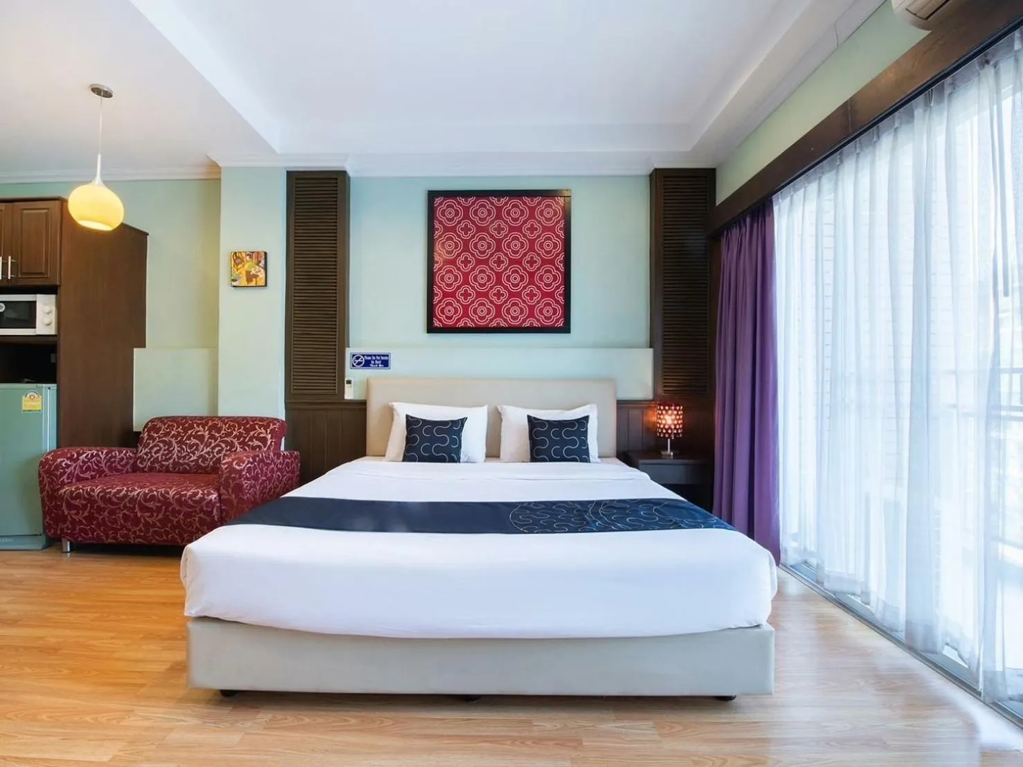 Bed in Blooming Hill Boutique Suites