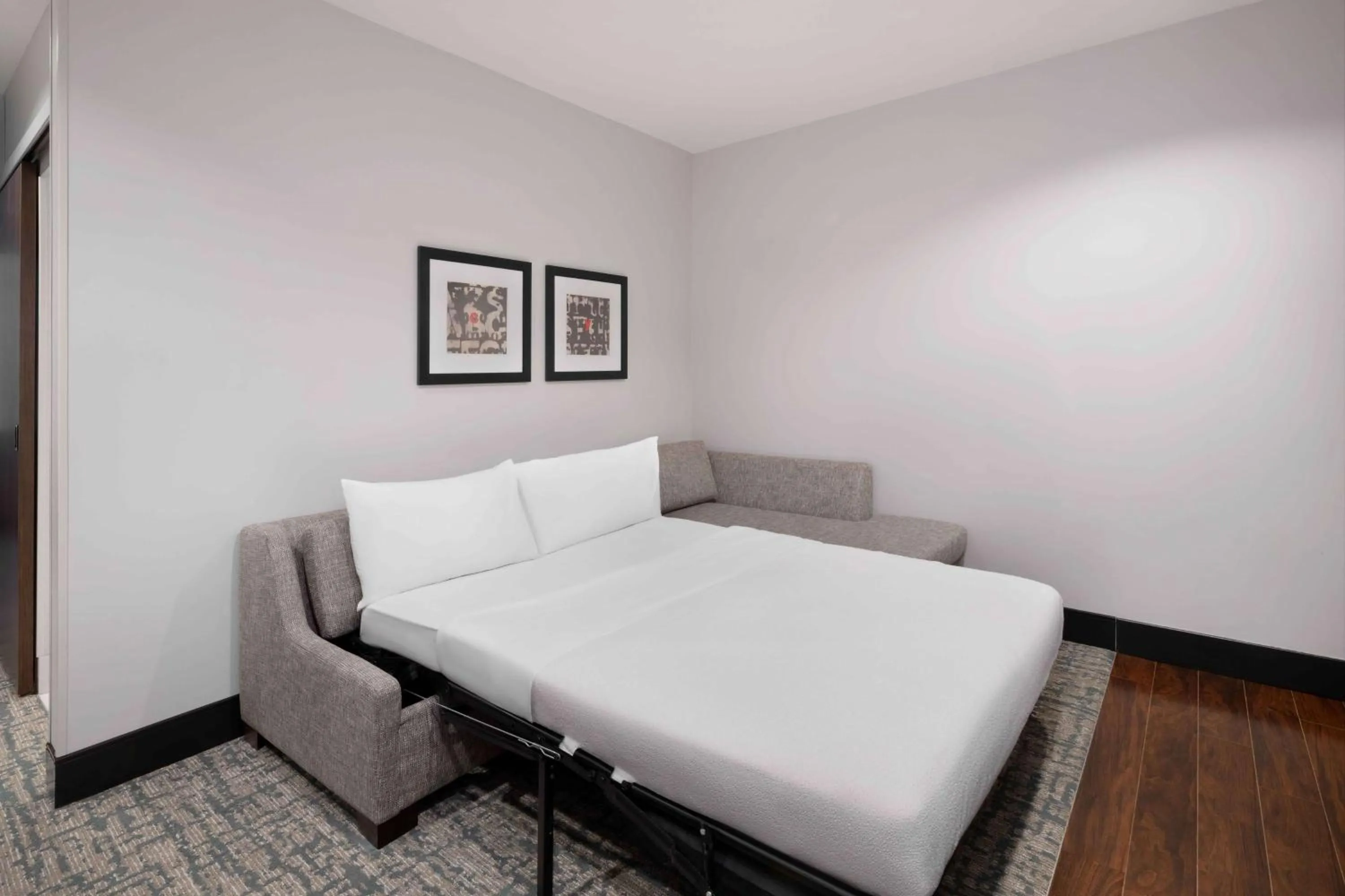 Living room, Bed in Homewood Suites- Denver Downtown Convention Center