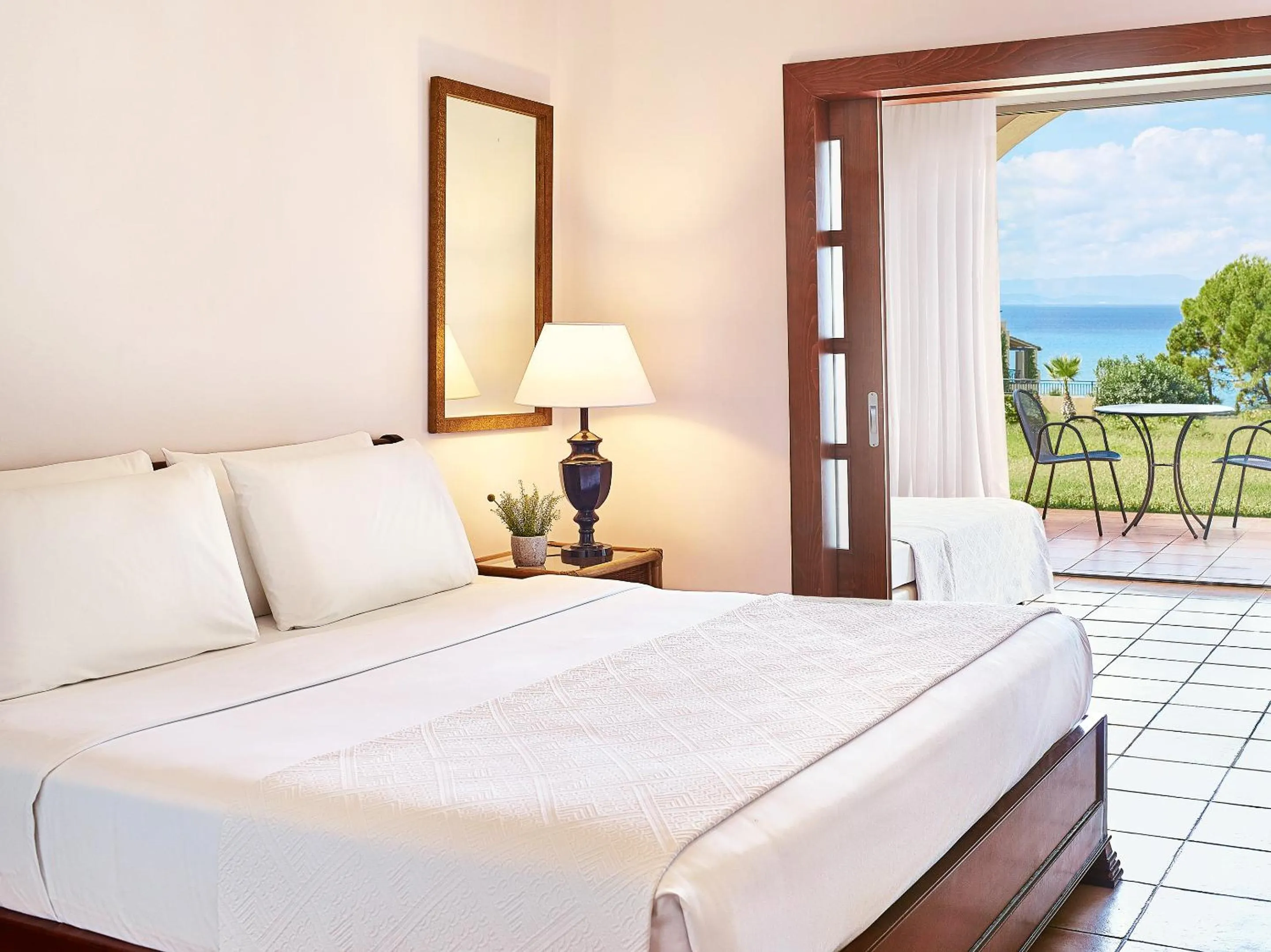 Bed in Grecotel LUXME Oasis at Riviera Olympia & Aqua Park