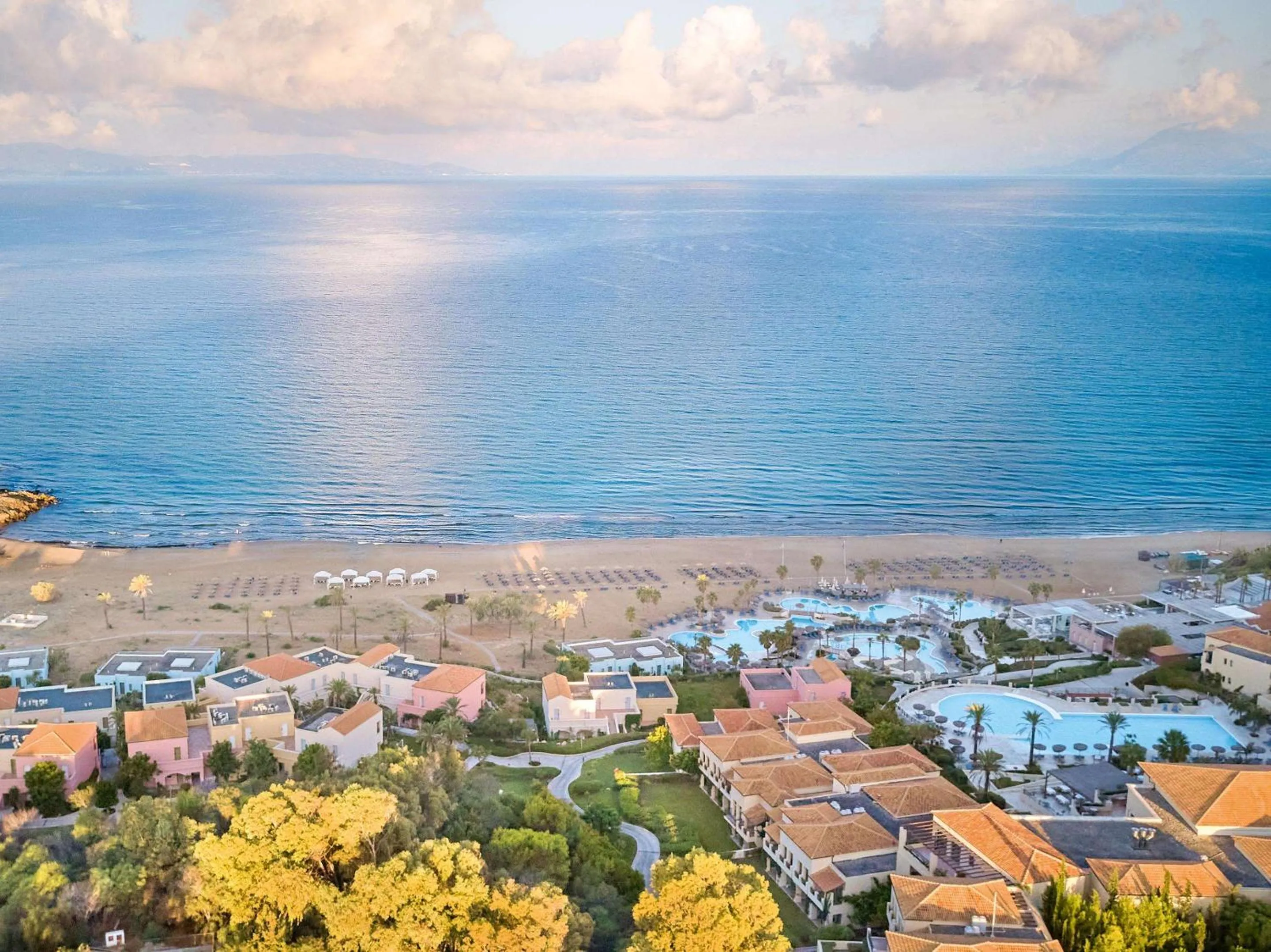 Beach in Grecotel LUXME Oasis at Riviera Olympia & Aqua Park