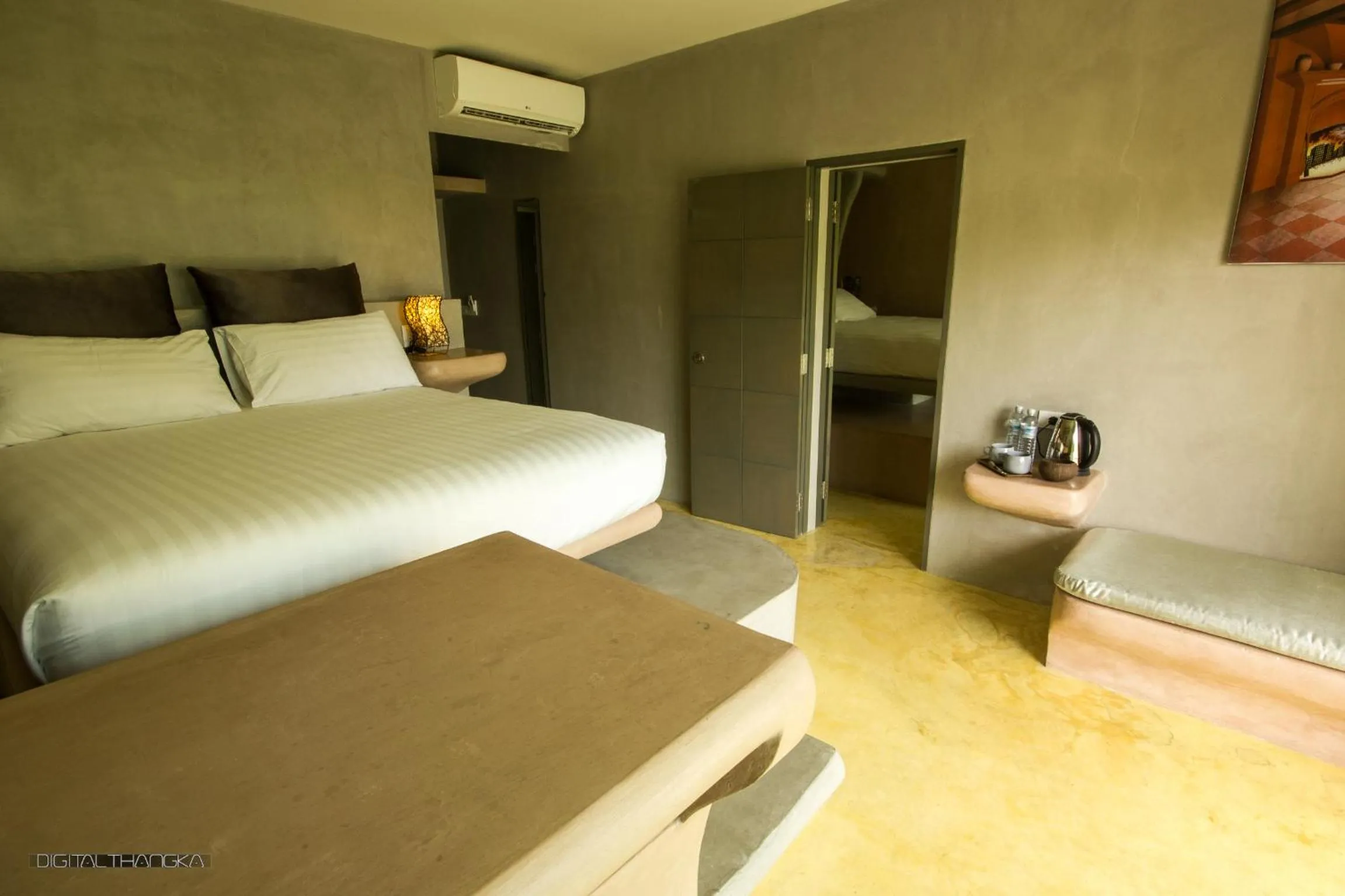 Bed in Le Divine Comedie Beach Resort