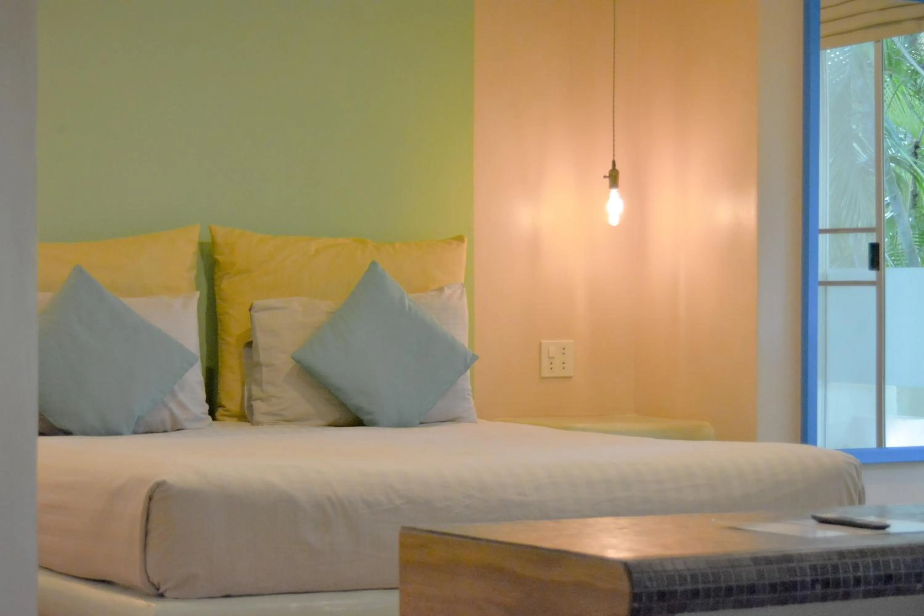 Bed in Le Divine Comedie Beach Resort