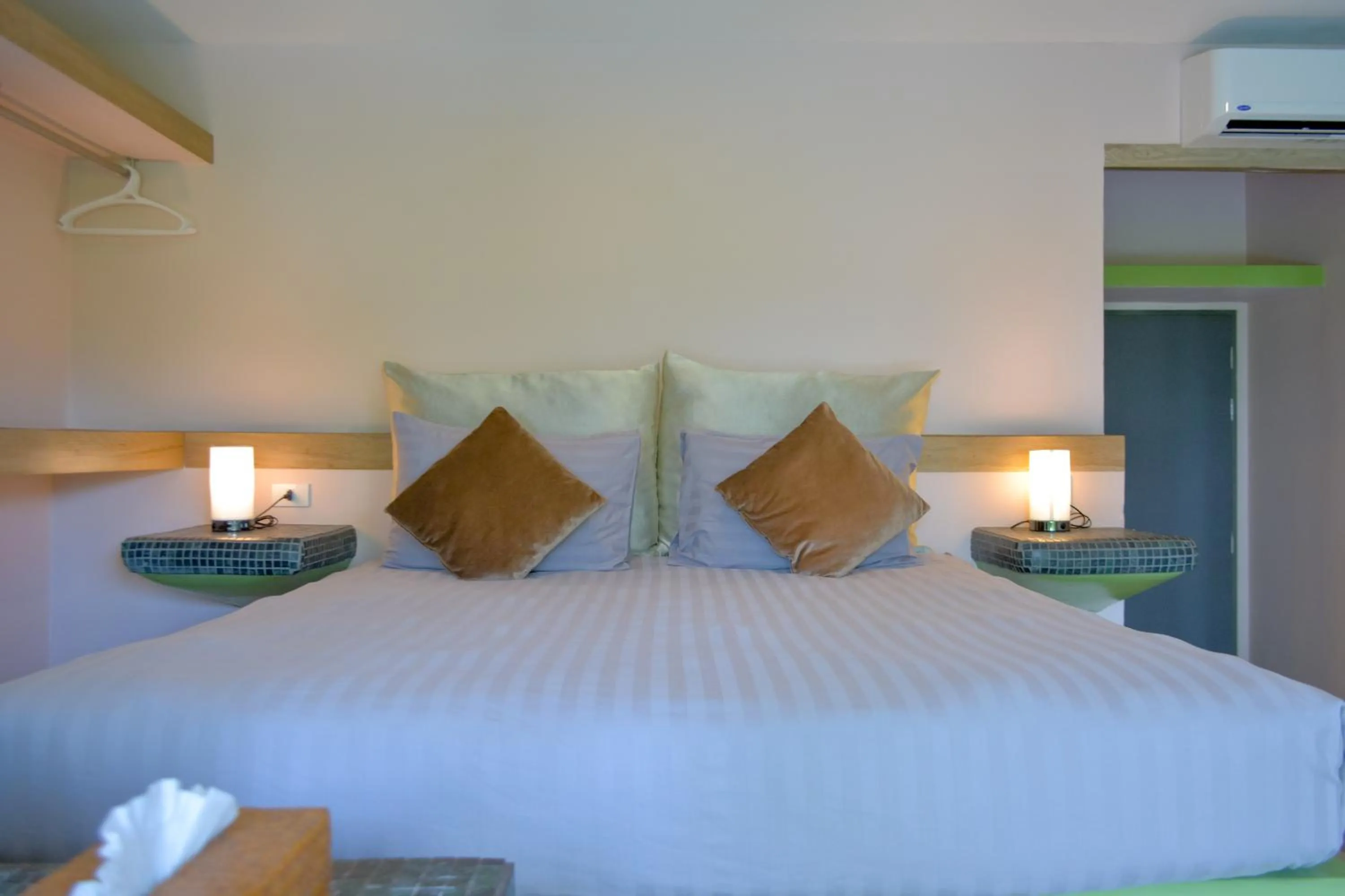 Bed in Le Divine Comedie Beach Resort