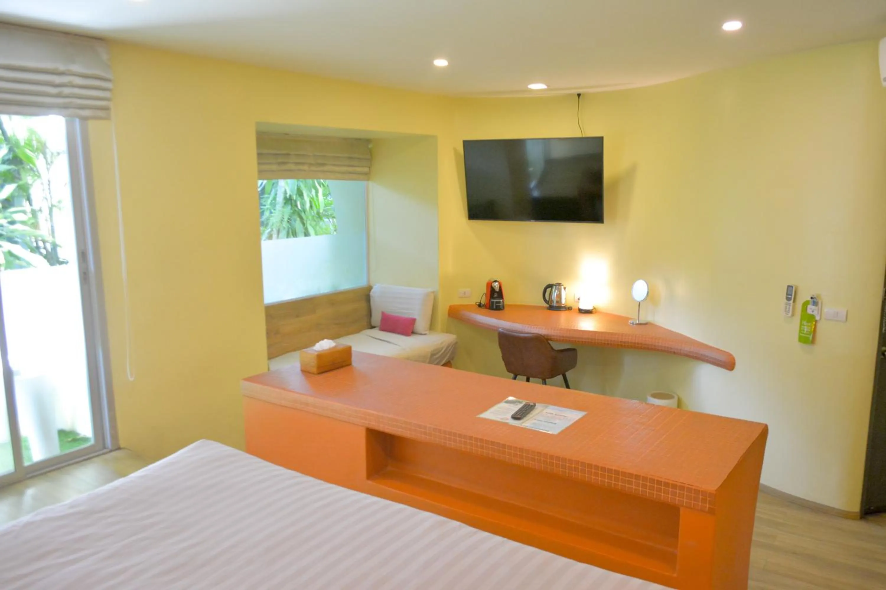 Bed in Le Divine Comedie Beach Resort