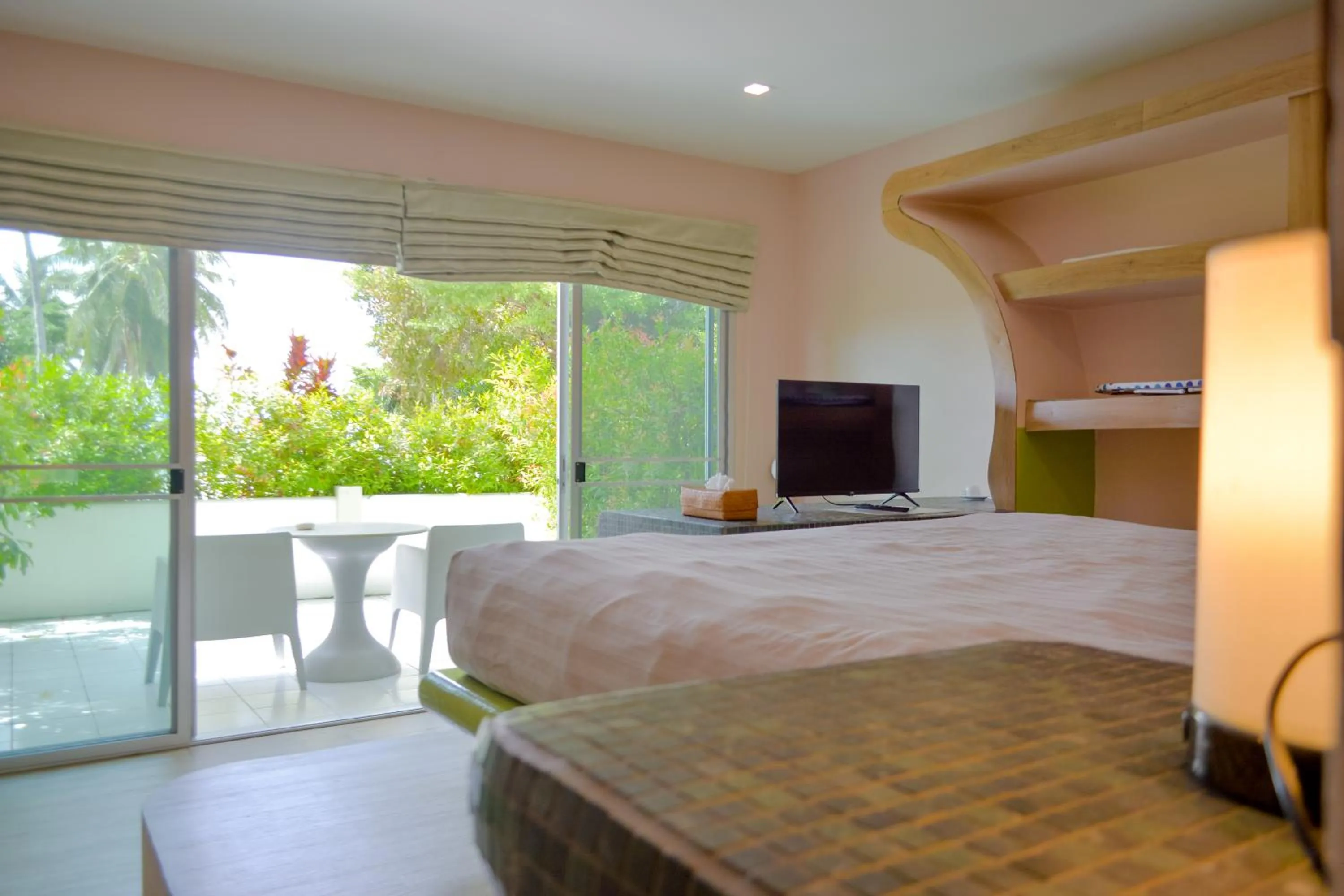 Bed in Le Divine Comedie Beach Resort