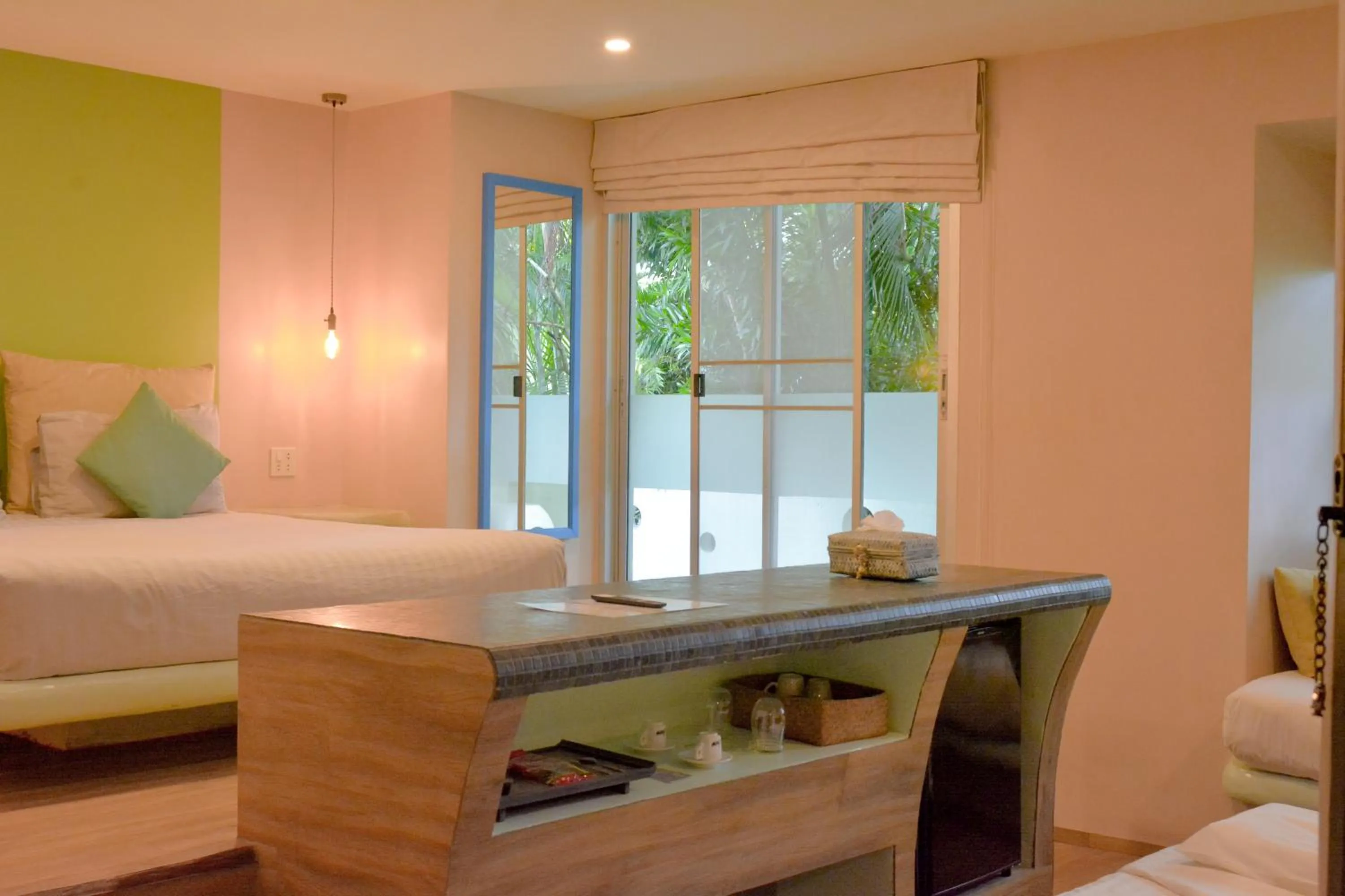 Bed in Le Divine Comedie Beach Resort