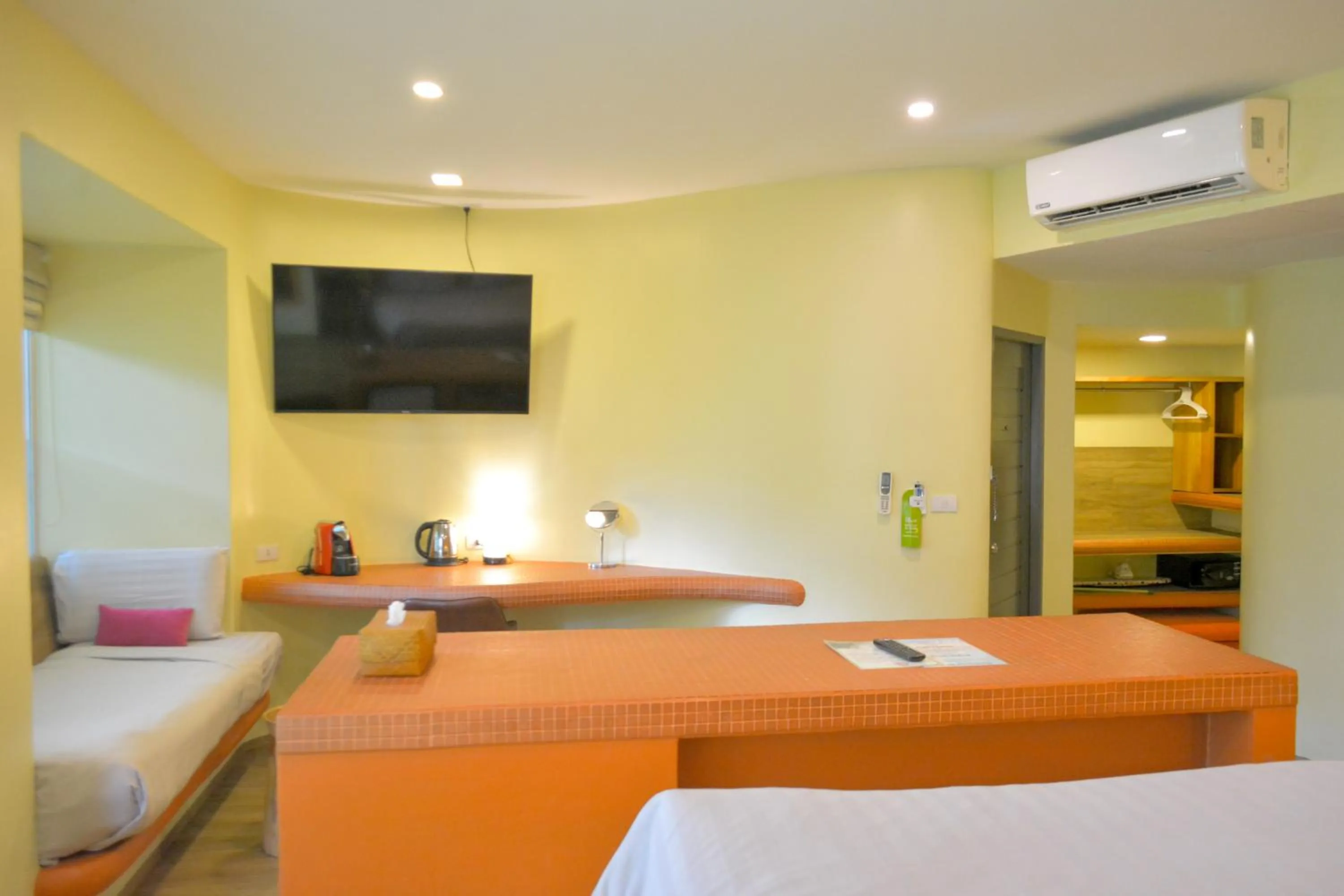 Bed in Le Divine Comedie Beach Resort