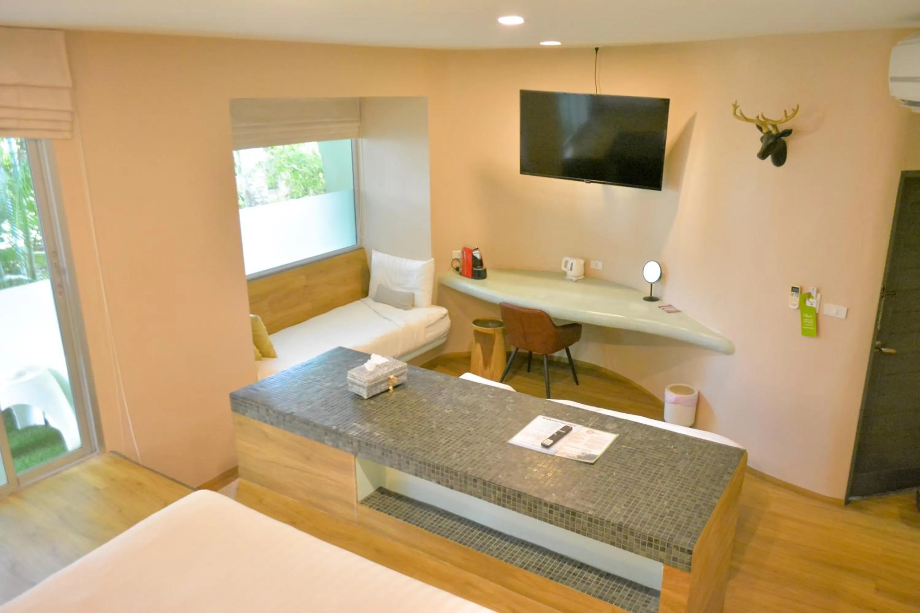 Bed in Le Divine Comedie Beach Resort