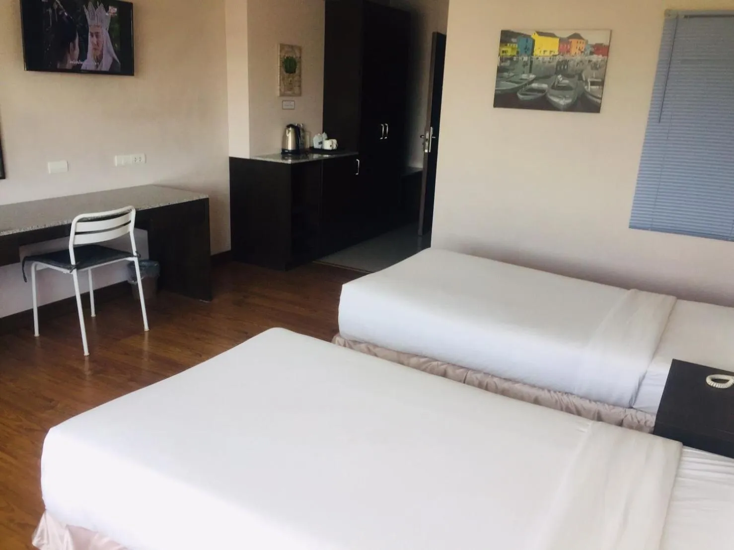 Bed in SinKiat Buri Hotel